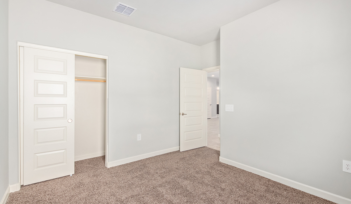 The Lakeway, situated within the beautiful Sycamore Vista community in Vail, Arizona, offers a perfect blend of functionality and comfort, ideal for both growing families and those who appreciate spacious living. With its 2,034 square feet of living space, this single-story new home features five bedrooms and three bathrooms, all meticulously designed to maximize space and convenience.  Entering The Lakeway, you’ll immediately notice the bright and airy atmosphere that flows through the open-concept floor plan. The heart of the home is the great room, seamlessly connected to the kitchen and dining area. The kitchen is equipped with quartz countertops, Shaker-style cabinetry, and a large island that serves as a focal point for both meal preparation and casual gatherings.  The primary bedroom is a true retreat, offering a spacious walk-in closet and an en-suite bathroom. The additional bedrooms are thoughtfully spaced to provide ample privacy for family members or guests, and the two secondary bathrooms are finished with modern fixtures and plenty of storage. This home offers a 2-3 car garage option for substantial space of vehicles and storage, accommodating the practical needs of busy households.  Standard features in The Lakeway at Sycamore Vista include energy-efficient elements like a tankless water heater, spray foam insulation, and LED lighting throughout. The home also comes with a Home is Connected® Smart Home package, which includes a smart thermostat, video doorbell, keyless entry, and more, ensuring modern conveniences are at your fingertips. The front yard is beautifully landscaped and includes an auto drip irrigation system, enhancing the curb appeal of this stunning home.  Nestled within Sycamore Vista, The Lakeway combines the tranquility of a rural setting with proximity to excellent schools, shopping, dining, and outdoor recreation, making it an exceptional place to call home.