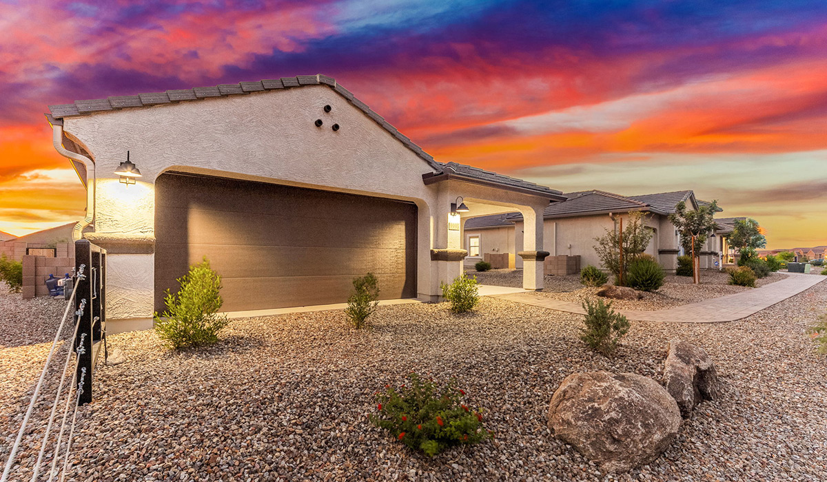 Explore New Homes at Saguaro Bloom by D.R. Horton – A Master-Planned Community in Marana, AZ. Nestled in the foothills of the breathtaking Tucson Mountains, Saguaro Bloom by D.R. Horton is a premier master-planned community in Northwest Marana that offers an exceptional living experience. Saguaro Bloom is divided into distinct neighborhoods, each offering its unique charm and amenities.  *Mesquite at Saguaro Bloom* is located in Block 1 and offers a variety of spacious floorplans with 18x18 tile flooring, granite countertops in kitchen and bathrooms, and Shaker-style cabinets in white or gray. These homes feature 9’ ceilings on the first floor, island kitchens, and the Home is Connected® Smart Home package, making them perfect for modern living.  *Agave at Saguaro Bloom*, situated in Block 7C, features homes with stunning 6x36” wood-look tile in gray, quartz countertops in kitchen and bathrooms, and Shaker-style cabinets. These homes are designed with stylish interiors and modern conveniences, including LED disc lighting and energy-efficient tankless water heaters.  *Cholla Ridge at Saguaro Bloom*, located in Block 7B, offers single-story homes on lots with no rear neighbors. These homes are distinguished by beautiful 12x24” tile flooring, gourmet kitchens, and 10’ ceilings in select homes. With 8’ sliding glass patio doors and super showers, Cholla Ridge combines luxury and privacy in a serene setting.  All homes in Saguaro Bloom are built with a Spanish lace stucco exterior, tile roofs, landscaped front yards with auto drip irrigation, and large, fully fenced backyards ready for your design. The homes also include covered front porches and back patios, stainless steel gas appliances, and executive height vanities in all bathrooms. Additionally, as of August 2024, all homes starting production are Zero Energy Ready, meeting rigorous energy efficiency standards that significantly reduce energy costs and environmental impact.  Residents of Saguaro Bloom enjoy an array of community amenities, including a clubhouse, two pools with lap lanes and lagoon entry, a fitness center, a splash pad, and over 30 miles of walking trails. The community also features more than 20 pocket parks, playgrounds, and coming soon, a large community park with tennis, pickleball, soccer, baseball, and a dog park. Saguaro Bloom is truly a lifestyle community, offering regular events like Food Truck Thursdays, Movies at the Pool, and holiday decorating contests, all fostering a strong sense of community.  Located in the highly-rated Marana Unified School District, Saguaro Bloom is close to excellent schools, including Rattlesnake Ridge Elementary, Marana Middle School, and Marana High School. The community’s location offers a perfect balance of seclusion and convenience, with quick access to I-10, grocery stores, restaurants, and the Twin Peaks Outlet, all within minutes. Downtown Tucson, with its vibrant arts, culture, and entertainment scene, is just a short 15-minute drive away.  Surrounded by the natural beauty of the desert landscape, residents can explore nearby outdoor attractions like Saguaro National Park West, the Arizona Desert Museum, and Quarry Pines Golf Course. Whether you enjoy hiking, biking, or simply taking in the stunning views, Saguaro Bloom offers an unparalleled lifestyle in one of Arizona’s most sought-after locations.  Discover the perfect blend of modern amenities, scenic beauty, and a strong sense of community at Saguaro Bloom by D.R. Horton – where your new home awaits in Marana, AZ.