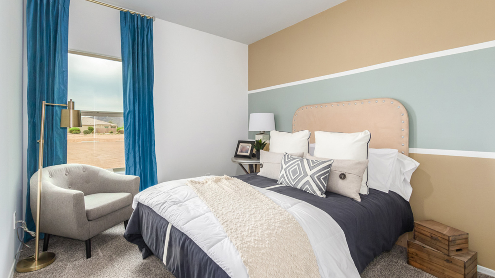 Welcome to The Amber, a thoughtfully designed single-story new home nestled in the Mesquite neighborhood at Saguaro Bloom, a master-planned community in Marana, Arizona. With 1,331 square feet of efficient living space, The Amber is perfect for those seeking a cozy yet functional home environment.  Enter into a welcoming entryway that immediately introduces you to the home’s smart layout. The open design maximizes every square foot, with the heart of the home being the expansive great room, which flows seamlessly into the dining area and kitchen. The kitchen is well-equipped with a central island, quartz countertops, and Shaker-style cabinets, offering a clean and modern aesthetic. A dedicated walk-in pantry adds extra storage, ensuring that all your culinary essentials are within reach.  The Amber offers three comfortable bedrooms. The primary suite is situated at the rear of the home, providing a sense of privacy. It includes a walk-in closet and an en-suite bathroom. The two additional bedrooms are thoughtfully placed near the front of the home, sharing access to a full bathroom, making this layout perfect for families, guests, or a home office.  Practicality meets comfort in this home, with a utility room conveniently located near the kitchen and garage, providing easy access to the laundry area and additional storage. The Amber also includes a covered patio that extends the living space outdoors, ideal for enjoying Arizona’s beautiful weather.  The Amber is not just a home; it’s a lifestyle. Located in the vibrant Saguaro Bloom community, residents enjoy access to a wide range of amenities, from swimming pools and parks to miles of scenic walking trails. Whether you’re a first-time homebuyer or looking to downsize, The Amber offers a perfect blend of comfort, style, and convenience in one of Marana’s most desirable neighborhoods.