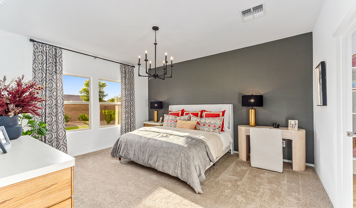 The Cali is a standout single-story new home floorplan available in the Saguaro Bloom community in Marana, Arizona. Offering 1,823 square feet of living space, this home is designed to accommodate modern living with comfort and style. The Cali provides a flexible layout with four bedrooms and two bathrooms, making it an ideal choice for families of all sizes.  The exterior of the Cali presents an inviting façade with its beautiful exterior finishes to suit diverse tastes. As you step inside, you'll be welcomed by a spacious great room that seamlessly connects to the kitchen and dining areas, making it perfect for gatherings and day-to-day living.  This home is equipped with a range of standard features that enhance both its functionality and appeal. Enjoy energy-efficient LED lighting throughout, and a programmable thermostat for easy climate control. The home also includes high-quality finishes such as quartz countertops in the kitchen and bathrooms, and durable wood-look tile flooring in the main living areas.  The kitchen, a focal point of the home, is equipped with stainless steel appliances, ample counter space, and a walk-in pantry that enhances both function and style. The primary bedroom, located at the rear of the home, offers privacy and includes a large walk-in closet and a modern ensuite bathroom with dual vanities and a spacious shower. The remaining three bedrooms are well-sized and share a conveniently located bathroom.  Designed with practicality in mind, this floorplan includes a two-car garage with an option for a third, a utility room with washer and dryer connections, and additional storage space.   Living in Agave at Saguaro Bloom provides residents with access to top-rated schools, community parks, and scenic walking trails. This vibrant neighborhood is the perfect setting for those looking to enjoy the best of Arizona living.  *Images shown are for reference only. They depict the sales model home and may not represent the actual home.