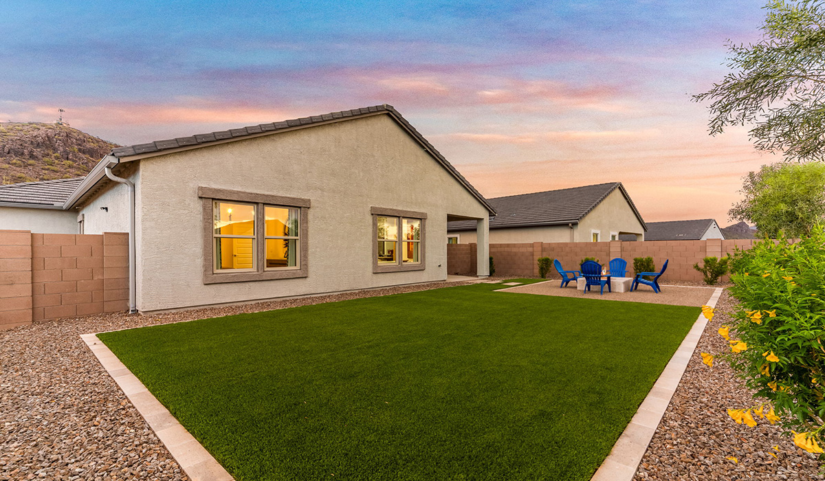 The Cali is a standout single-story new home floorplan available in the Saguaro Bloom community in Marana, Arizona. Offering 1,823 square feet of living space, this home is designed to accommodate modern living with comfort and style. The Cali provides a flexible layout with four bedrooms and two bathrooms, making it an ideal choice for families of all sizes.  The exterior of the Cali presents an inviting façade with its beautiful exterior finishes to suit diverse tastes. As you step inside, you'll be welcomed by a spacious great room that seamlessly connects to the kitchen and dining areas, making it perfect for gatherings and day-to-day living.  This home is equipped with a range of standard features that enhance both its functionality and appeal. Enjoy energy-efficient LED lighting throughout, and a programmable thermostat for easy climate control. The home also includes high-quality finishes such as quartz countertops in the kitchen and bathrooms, and durable wood-look tile flooring in the main living areas.  The kitchen, a focal point of the home, is equipped with stainless steel appliances, ample counter space, and a walk-in pantry that enhances both function and style. The primary bedroom, located at the rear of the home, offers privacy and includes a large walk-in closet and a modern ensuite bathroom with dual vanities and a spacious shower. The remaining three bedrooms are well-sized and share a conveniently located bathroom.  Designed with practicality in mind, this floorplan includes a two-car garage with an option for a third, a utility room with washer and dryer connections, and additional storage space.   Living in Agave at Saguaro Bloom provides residents with access to top-rated schools, community parks, and scenic walking trails. This vibrant neighborhood is the perfect setting for those looking to enjoy the best of Arizona living.  *Images shown are for reference only. They depict the sales model home and may not represent the actual home.