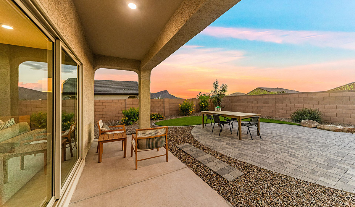 Welcome to the Kingston floor plan at Saguaro Bloom, Marana, Arizona, a perfect blend of comfort, modern living, and energy efficiency. This thoughtfully crafted one-story home spans 2,051 square feet and offers four bedrooms and two bathrooms, ideal for families of all sizes.  The open-concept design features a spacious great room that effortlessly connects with the kitchen and dining area, creating an inviting central hub for everyday living and entertaining. The kitchen is equipped with contemporary appliances and a pantry.  The primary bedroom, located at the rear of the home, provides a peaceful retreat with a private ensuite bathroom and a walk-in closet. The additional three bedrooms are positioned at the front of the house, offering versatility for use as guest rooms, a home office, or children’s bedrooms. Step outside to the covered patio, a perfect spot to enjoy the beautiful Arizona weather.  Built with energy efficiency as a priority, the Kingston includes smart home technology, which not only simplifies daily living but also helps reduce utility costs. A two-car garage provides ample parking and additional storage space, enhancing the home’s functionality.  Residents of Saguaro Bloom enjoy access to a range of community amenities, including parks, walking trails, and recreational facilities, making this home an ideal choice for those seeking a balanced lifestyle in a scenic setting.  *Images shown are for reference only. They depict The Kingston sales model home and may not represent the actual home.