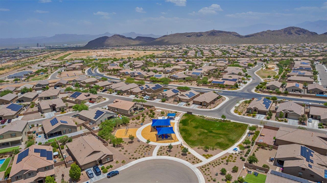 Welcome to The Amber, a thoughtfully designed single-story new home nestled in the Mesquite neighborhood at Saguaro Bloom, a master-planned community in Marana, Arizona. With 1,331 square feet of efficient living space, The Amber is perfect for those seeking a cozy yet functional home environment.  Enter into a welcoming entryway that immediately introduces you to the home’s smart layout. The open design maximizes every square foot, with the heart of the home being the expansive great room, which flows seamlessly into the dining area and kitchen. The kitchen is well-equipped with a central island, quartz countertops, and Shaker-style cabinets, offering a clean and modern aesthetic. A dedicated walk-in pantry adds extra storage, ensuring that all your culinary essentials are within reach.  The Amber offers three comfortable bedrooms. The primary suite is situated at the rear of the home, providing a sense of privacy. It includes a walk-in closet and an en-suite bathroom. The two additional bedrooms are thoughtfully placed near the front of the home, sharing access to a full bathroom, making this layout perfect for families, guests, or a home office.  Practicality meets comfort in this home, with a utility room conveniently located near the kitchen and garage, providing easy access to the laundry area and additional storage. The Amber also includes a covered patio that extends the living space outdoors, ideal for enjoying Arizona’s beautiful weather.  The Amber is not just a home; it’s a lifestyle. Located in the vibrant Saguaro Bloom community, residents enjoy access to a wide range of amenities, from swimming pools and parks to miles of scenic walking trails. Whether you’re a first-time homebuyer or looking to downsize, The Amber offers a perfect blend of comfort, style, and convenience in one of Marana’s most desirable neighborhoods.