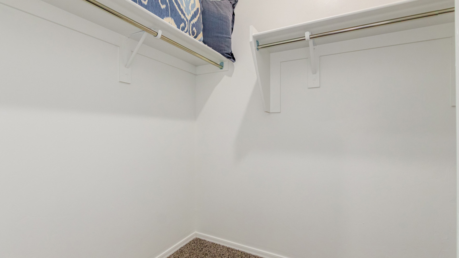 Welcome to The Amber, a thoughtfully designed single-story new home nestled in the Mesquite neighborhood at Saguaro Bloom, a master-planned community in Marana, Arizona. With 1,331 square feet of efficient living space, The Amber is perfect for those seeking a cozy yet functional home environment.  Enter into a welcoming entryway that immediately introduces you to the home’s smart layout. The open design maximizes every square foot, with the heart of the home being the expansive great room, which flows seamlessly into the dining area and kitchen. The kitchen is well-equipped with a central island, quartz countertops, and Shaker-style cabinets, offering a clean and modern aesthetic. A dedicated walk-in pantry adds extra storage, ensuring that all your culinary essentials are within reach.  The Amber offers three comfortable bedrooms. The primary suite is situated at the rear of the home, providing a sense of privacy. It includes a walk-in closet and an en-suite bathroom. The two additional bedrooms are thoughtfully placed near the front of the home, sharing access to a full bathroom, making this layout perfect for families, guests, or a home office.  Practicality meets comfort in this home, with a utility room conveniently located near the kitchen and garage, providing easy access to the laundry area and additional storage. The Amber also includes a covered patio that extends the living space outdoors, ideal for enjoying Arizona’s beautiful weather.  The Amber is not just a home; it’s a lifestyle. Located in the vibrant Saguaro Bloom community, residents enjoy access to a wide range of amenities, from swimming pools and parks to miles of scenic walking trails. Whether you’re a first-time homebuyer or looking to downsize, The Amber offers a perfect blend of comfort, style, and convenience in one of Marana’s most desirable neighborhoods.