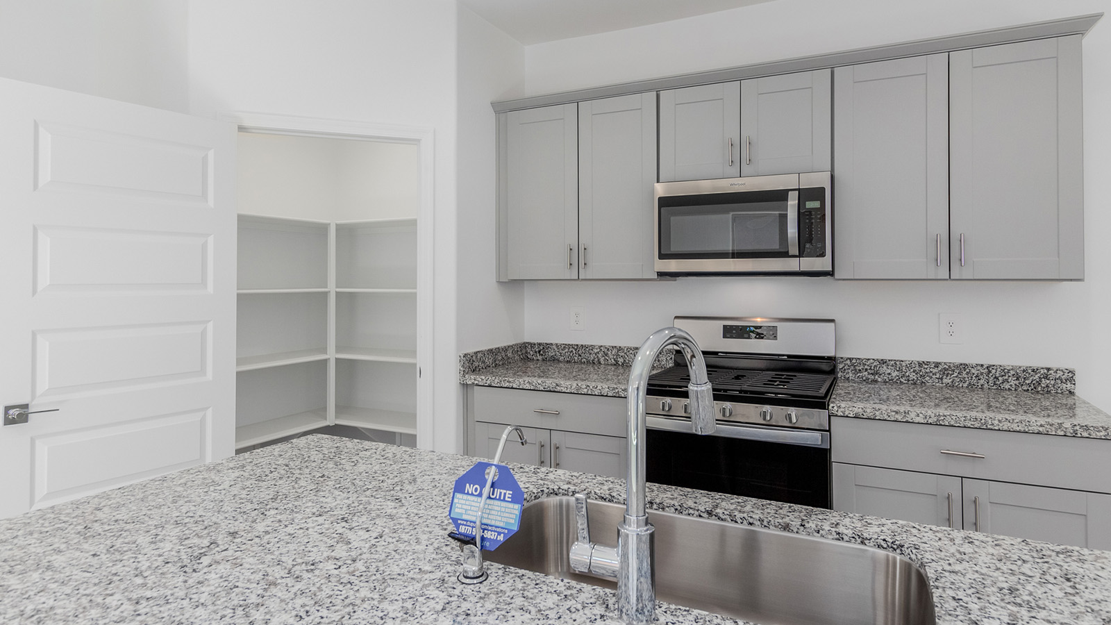 Welcome to The Diana, a beautifully designed single-story new home located in the Mesquite neighborhood at Saguaro Bloom, one of Marana’s premier master-planned communities. Spanning 1,558 square feet, The Diana offers an ideal balance of comfort and style, perfectly suited for modern living.  As you step inside, you are welcomed by an inviting entryway that leads into the heart of the home. The open layout is designed for convenience, with a spacious great room that seamlessly integrates with the dining area and kitchen, creating a central space perfect for everyday life and entertaining. The kitchen is a true centerpiece, featuring an island, quartz countertops, and stylish Shaker-style cabinetry, all working together to create a space that is practical and elegant.  The Diana offers three bedrooms and provides ample room for everyone in the household. The primary bedroom is thoughtfully positioned for privacy and comes with a walk-in closet and a private en-suite bathroom, offering a personal retreat at the end of the day. The two additional bedrooms are located near the front of the home, sharing a full bathroom, making this layout ideal for families or for extra guest space.  With a dedicated utility room conveniently situated near the entry and a spacious pantry just off the kitchen, The Diana is designed to meet the needs of today’s busy lifestyles. Large windows throughout the home allow natural light to fill the space, creating a bright and welcoming atmosphere.  Step outside to the covered patio, perfect for enjoying the Arizona climate. Whether you're hosting a summer barbecue or simply unwinding in the evening, this outdoor space is a valuable addition to the home.  Situated in the desirable Saguaro Bloom community, residents will enjoy access to a wide range of amenities, including community pools, walking trails, and parks, all surrounded by the natural beauty of the Tucson Mountains.