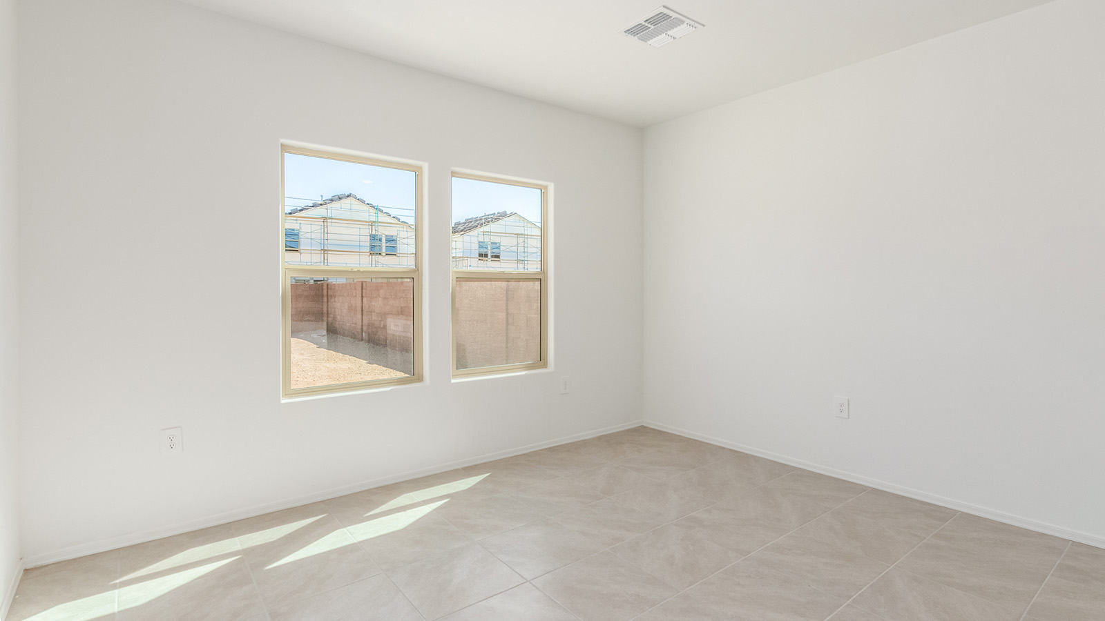 Welcome to The Grace, an intentionally designed two-story new home nestled in the Mesquite neighborhood at Saguaro Bloom, one of Marana’s most desirable communities. Offering 1,963 square feet of living space, The Grace is perfect for those who value both comfort and modern design.  As you enter through the front porch, a welcoming foyer leads you into the open-concept main floor, where the great room, dining area, and kitchen are seamlessly connected. The kitchen is a chef’s delight, featuring a central island, granite countertops, and elegant Shaker-style cabinetry available in either white or gray. The layout is designed to maximize both function and style, ensuring that whether you're preparing a meal or hosting guests, the space works for you.  Upstairs, The Grace features four spacious bedrooms, each offering privacy and ample room for relaxation. The primary suite is a highlight, offering a private retreat with a walk-in closet and an en-suite bathroom equipped with dual vanities and a spacious shower. The additional bedrooms share a luxurious bathroom, and the convenient upstairs utility room makes laundry day a breeze.  The Grace also includes a covered patio, extending your living space outdoors, perfect for enjoying the beautiful Arizona evenings. The practical design continues with a dedicated powder room on the main level, making it convenient for guests.  This home is designed with today’s homeowner in mind, incorporating smart home technology and energy-efficient features that ensure a modern lifestyle while keeping energy costs down. Large windows allow natural light to fill the space, creating a bright and airy atmosphere throughout.  Located in the vibrant Saguaro Bloom community, The Grace offers residents access to a wealth of amenities, including community pools, walking trails, and more, all set against the stunning backdrop of the Tucson Mountains. The Grace is not just a home; it's an opportunity to live in comfort and style while enjoying everything this exceptional community has to offer.