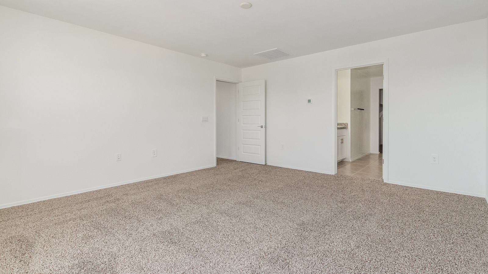 Welcome to The Grace, an intentionally designed two-story new home nestled in the Mesquite neighborhood at Saguaro Bloom, one of Marana’s most desirable communities. Offering 1,963 square feet of living space, The Grace is perfect for those who value both comfort and modern design.  As you enter through the front porch, a welcoming foyer leads you into the open-concept main floor, where the great room, dining area, and kitchen are seamlessly connected. The kitchen is a chef’s delight, featuring a central island, granite countertops, and elegant Shaker-style cabinetry available in either white or gray. The layout is designed to maximize both function and style, ensuring that whether you're preparing a meal or hosting guests, the space works for you.  Upstairs, The Grace features four spacious bedrooms, each offering privacy and ample room for relaxation. The primary suite is a highlight, offering a private retreat with a walk-in closet and an en-suite bathroom equipped with dual vanities and a spacious shower. The additional bedrooms share a luxurious bathroom, and the convenient upstairs utility room makes laundry day a breeze.  The Grace also includes a covered patio, extending your living space outdoors, perfect for enjoying the beautiful Arizona evenings. The practical design continues with a dedicated powder room on the main level, making it convenient for guests.  This home is designed with today’s homeowner in mind, incorporating smart home technology and energy-efficient features that ensure a modern lifestyle while keeping energy costs down. Large windows allow natural light to fill the space, creating a bright and airy atmosphere throughout.  Located in the vibrant Saguaro Bloom community, The Grace offers residents access to a wealth of amenities, including community pools, walking trails, and more, all set against the stunning backdrop of the Tucson Mountains. The Grace is not just a home; it's an opportunity to live in comfort and style while enjoying everything this exceptional community has to offer.