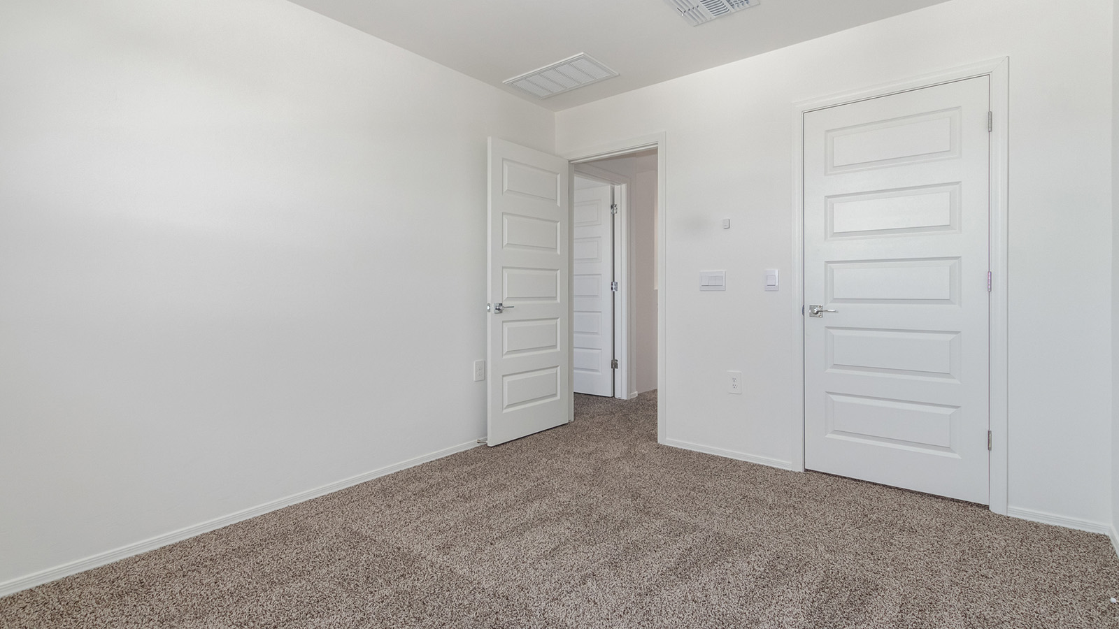 Welcome to The Grace, an intentionally designed two-story new home nestled in the Mesquite neighborhood at Saguaro Bloom, one of Marana’s most desirable communities. Offering 1,963 square feet of living space, The Grace is perfect for those who value both comfort and modern design.  As you enter through the front porch, a welcoming foyer leads you into the open-concept main floor, where the great room, dining area, and kitchen are seamlessly connected. The kitchen is a chef’s delight, featuring a central island, granite countertops, and elegant Shaker-style cabinetry available in either white or gray. The layout is designed to maximize both function and style, ensuring that whether you're preparing a meal or hosting guests, the space works for you.  Upstairs, The Grace features four spacious bedrooms, each offering privacy and ample room for relaxation. The primary suite is a highlight, offering a private retreat with a walk-in closet and an en-suite bathroom equipped with dual vanities and a spacious shower. The additional bedrooms share a luxurious bathroom, and the convenient upstairs utility room makes laundry day a breeze.  The Grace also includes a covered patio, extending your living space outdoors, perfect for enjoying the beautiful Arizona evenings. The practical design continues with a dedicated powder room on the main level, making it convenient for guests.  This home is designed with today’s homeowner in mind, incorporating smart home technology and energy-efficient features that ensure a modern lifestyle while keeping energy costs down. Large windows allow natural light to fill the space, creating a bright and airy atmosphere throughout.  Located in the vibrant Saguaro Bloom community, The Grace offers residents access to a wealth of amenities, including community pools, walking trails, and more, all set against the stunning backdrop of the Tucson Mountains. The Grace is not just a home; it's an opportunity to live in comfort and style while enjoying everything this exceptional community has to offer.