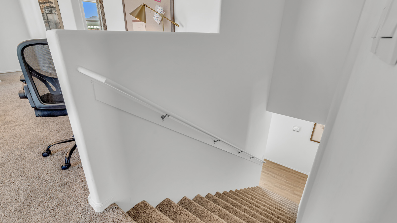 Introducing The Kate, a spacious two-story new home located in the Mesquite neighborhood at Saguaro Bloom, one of Marana's premier communities. This residence, offering 2,264 square feet of living space, is designed to accommodate a variety of lifestyles, with four bedrooms and two and a half bathrooms.  As you enter through the welcoming front porch, you’re immediately drawn into an expansive and open living area. The great room, which flows effortlessly into the dining area and kitchen, serves as the heart of the home, making it perfect for gatherings and everyday living. The kitchen is both functional and stylish, featuring a central island, quartz countertops, and Shaker-style cabinetry. A pantry provides additional storage, keeping your kitchen organized.  Upstairs, The Kate continues to impress with a layout that emphasizes comfort and convenience. The primary bedroom is a peaceful getaway, complete with a walk-in closet and ensuite bathroom. The additional three bedrooms are generously sized and share access to a full bathroom. A dedicated loft provides a flexible space that can be used as a play area, media room, or home office.  The home also includes a powder room on the main level, perfect for guests, and a large utility room upstairs, adding practicality to the daily routine. The covered patio extends your living space outdoors, ideal for enjoying the beautiful Arizona weather.  Built with modern living in mind, The Kate has energy-efficient features, ensuring comfort and sustainability for years to come. Large windows throughout the home allow natural light to brighten every corner, creating a warm and inviting atmosphere.  Situated within the vibrant Saguaro Bloom community, residents have access to many amenities, including swimming pools, walking trails, and parks.   *Images shown are for reference only. They depict the sales model home and may not represent the actual home.