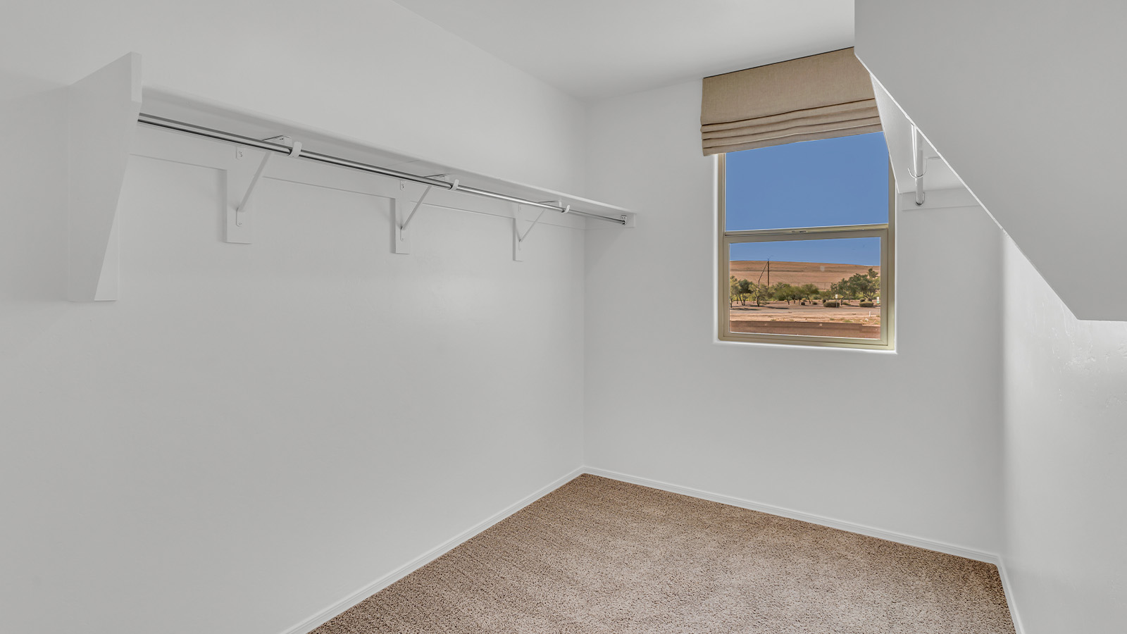 Introducing The Kate, a spacious two-story new home located in the Mesquite neighborhood at Saguaro Bloom, one of Marana's premier communities. This residence, offering 2,264 square feet of living space, is designed to accommodate a variety of lifestyles, with four bedrooms and two and a half bathrooms.  As you enter through the welcoming front porch, you’re immediately drawn into an expansive and open living area. The great room, which flows effortlessly into the dining area and kitchen, serves as the heart of the home, making it perfect for gatherings and everyday living. The kitchen is both functional and stylish, featuring a central island, quartz countertops, and Shaker-style cabinetry. A pantry provides additional storage, keeping your kitchen organized.  Upstairs, The Kate continues to impress with a layout that emphasizes comfort and convenience. The primary bedroom is a peaceful getaway, complete with a walk-in closet and ensuite bathroom. The additional three bedrooms are generously sized and share access to a full bathroom. A dedicated loft provides a flexible space that can be used as a play area, media room, or home office.  The home also includes a powder room on the main level, perfect for guests, and a large utility room upstairs, adding practicality to the daily routine. The covered patio extends your living space outdoors, ideal for enjoying the beautiful Arizona weather.  Built with modern living in mind, The Kate has energy-efficient features, ensuring comfort and sustainability for years to come. Large windows throughout the home allow natural light to brighten every corner, creating a warm and inviting atmosphere.  Situated within the vibrant Saguaro Bloom community, residents have access to many amenities, including swimming pools, walking trails, and parks.   *Images shown are for reference only. They depict the sales model home and may not represent the actual home.