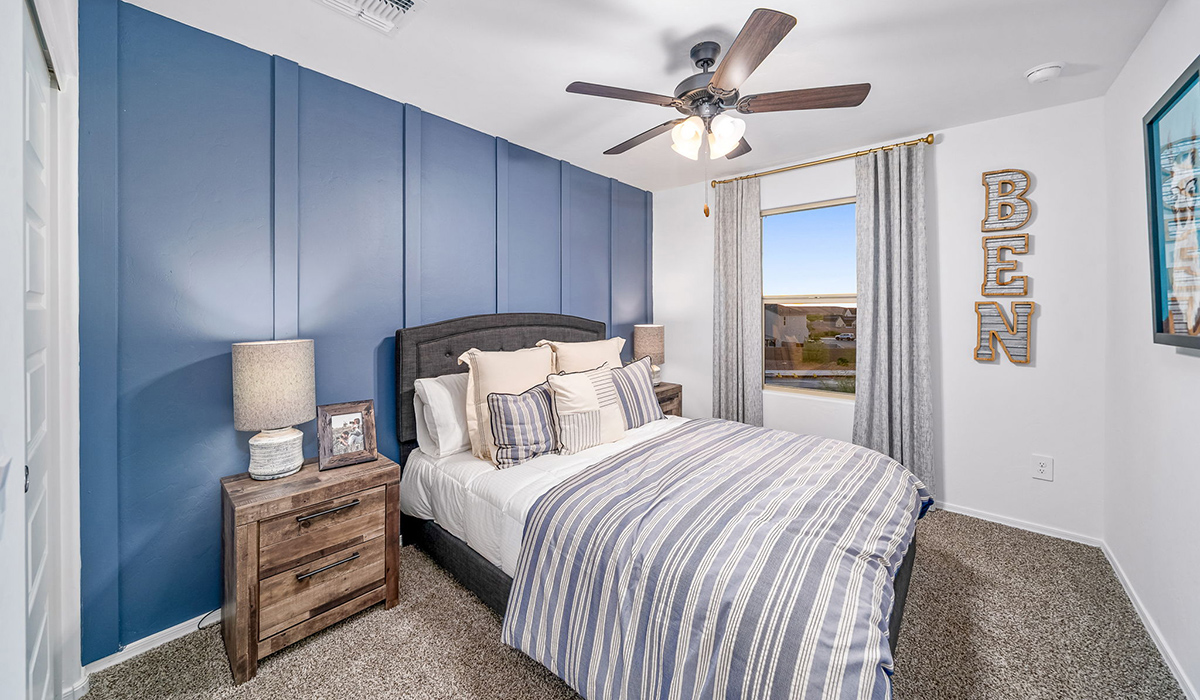 Introducing The Kate, a spacious two-story new home located in the Mesquite neighborhood at Saguaro Bloom, one of Marana's premier communities. This residence, offering 2,264 square feet of living space, is designed to accommodate a variety of lifestyles, with four bedrooms and two and a half bathrooms.  As you enter through the welcoming front porch, you’re immediately drawn into an expansive and open living area. The great room, which flows effortlessly into the dining area and kitchen, serves as the heart of the home, making it perfect for gatherings and everyday living. The kitchen is both functional and stylish, featuring a central island, quartz countertops, and Shaker-style cabinetry. A pantry provides additional storage, keeping your kitchen organized.  Upstairs, The Kate continues to impress with a layout that emphasizes comfort and convenience. The primary bedroom is a peaceful getaway, complete with a walk-in closet and ensuite bathroom. The additional three bedrooms are generously sized and share access to a full bathroom. A dedicated loft provides a flexible space that can be used as a play area, media room, or home office.  The home also includes a powder room on the main level, perfect for guests, and a large utility room upstairs, adding practicality to the daily routine. The covered patio extends your living space outdoors, ideal for enjoying the beautiful Arizona weather.  Built with modern living in mind, The Kate has energy-efficient features, ensuring comfort and sustainability for years to come. Large windows throughout the home allow natural light to brighten every corner, creating a warm and inviting atmosphere.  Situated within the vibrant Saguaro Bloom community, residents have access to many amenities, including swimming pools, walking trails, and parks.   *Images shown are for reference only. They depict the sales model home and may not represent the actual home.