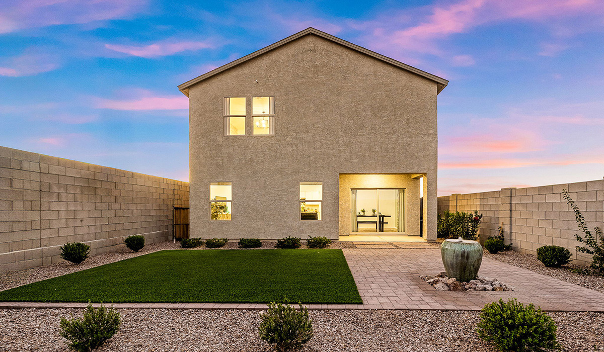 Introducing The Kate, a spacious two-story new home located in the Mesquite neighborhood at Saguaro Bloom, one of Marana's premier communities. This residence, offering 2,264 square feet of living space, is designed to accommodate a variety of lifestyles, with four bedrooms and two and a half bathrooms.  As you enter through the welcoming front porch, you’re immediately drawn into an expansive and open living area. The great room, which flows effortlessly into the dining area and kitchen, serves as the heart of the home, making it perfect for gatherings and everyday living. The kitchen is both functional and stylish, featuring a central island, quartz countertops, and Shaker-style cabinetry. A pantry provides additional storage, keeping your kitchen organized.  Upstairs, The Kate continues to impress with a layout that emphasizes comfort and convenience. The primary bedroom is a peaceful getaway, complete with a walk-in closet and ensuite bathroom. The additional three bedrooms are generously sized and share access to a full bathroom. A dedicated loft provides a flexible space that can be used as a play area, media room, or home office.  The home also includes a powder room on the main level, perfect for guests, and a large utility room upstairs, adding practicality to the daily routine. The covered patio extends your living space outdoors, ideal for enjoying the beautiful Arizona weather.  Built with modern living in mind, The Kate has energy-efficient features, ensuring comfort and sustainability for years to come. Large windows throughout the home allow natural light to brighten every corner, creating a warm and inviting atmosphere.  Situated within the vibrant Saguaro Bloom community, residents have access to many amenities, including swimming pools, walking trails, and parks.   *Images shown are for reference only. They depict the sales model home and may not represent the actual home.