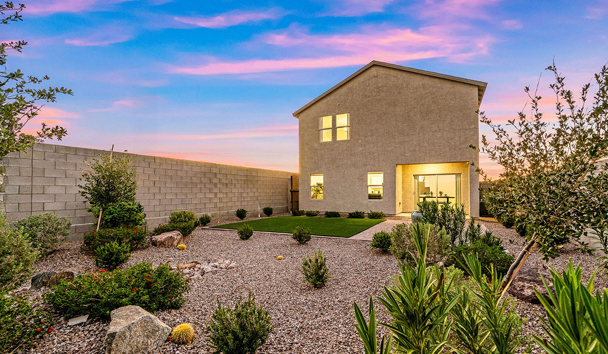 Introducing The Kate, a spacious two-story new home located in the Mesquite neighborhood at Saguaro Bloom, one of Marana's premier communities. This residence, offering 2,264 square feet of living space, is designed to accommodate a variety of lifestyles, with four bedrooms and two and a half bathrooms.  As you enter through the welcoming front porch, you’re immediately drawn into an expansive and open living area. The great room, which flows effortlessly into the dining area and kitchen, serves as the heart of the home, making it perfect for gatherings and everyday living. The kitchen is both functional and stylish, featuring a central island, quartz countertops, and Shaker-style cabinetry. A pantry provides additional storage, keeping your kitchen organized.  Upstairs, The Kate continues to impress with a layout that emphasizes comfort and convenience. The primary bedroom is a peaceful getaway, complete with a walk-in closet and ensuite bathroom. The additional three bedrooms are generously sized and share access to a full bathroom. A dedicated loft provides a flexible space that can be used as a play area, media room, or home office.  The home also includes a powder room on the main level, perfect for guests, and a large utility room upstairs, adding practicality to the daily routine. The covered patio extends your living space outdoors, ideal for enjoying the beautiful Arizona weather.  Built with modern living in mind, The Kate has energy-efficient features, ensuring comfort and sustainability for years to come. Large windows throughout the home allow natural light to brighten every corner, creating a warm and inviting atmosphere.  Situated within the vibrant Saguaro Bloom community, residents have access to many amenities, including swimming pools, walking trails, and parks.   *Images shown are for reference only. They depict the sales model home and may not represent the actual home.