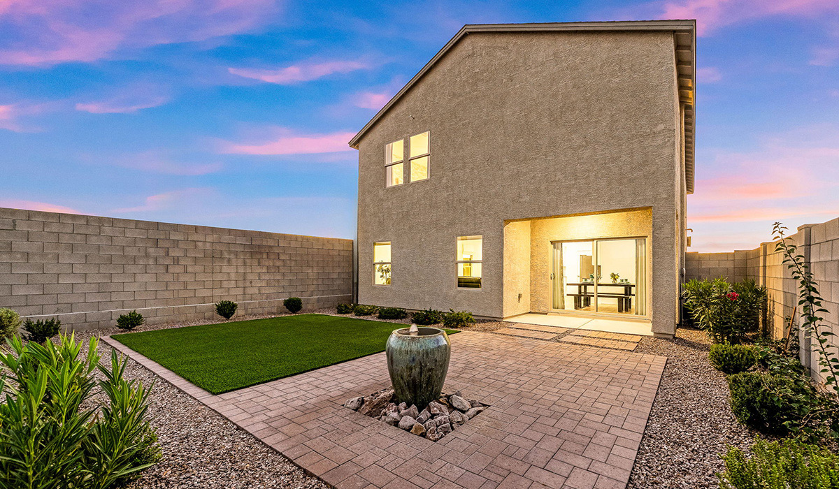 Introducing The Kate, a spacious two-story new home located in the Mesquite neighborhood at Saguaro Bloom, one of Marana's premier communities. This residence, offering 2,264 square feet of living space, is designed to accommodate a variety of lifestyles, with four bedrooms and two and a half bathrooms.  As you enter through the welcoming front porch, you’re immediately drawn into an expansive and open living area. The great room, which flows effortlessly into the dining area and kitchen, serves as the heart of the home, making it perfect for gatherings and everyday living. The kitchen is both functional and stylish, featuring a central island, quartz countertops, and Shaker-style cabinetry. A pantry provides additional storage, keeping your kitchen organized.  Upstairs, The Kate continues to impress with a layout that emphasizes comfort and convenience. The primary bedroom is a peaceful getaway, complete with a walk-in closet and ensuite bathroom. The additional three bedrooms are generously sized and share access to a full bathroom. A dedicated loft provides a flexible space that can be used as a play area, media room, or home office.  The home also includes a powder room on the main level, perfect for guests, and a large utility room upstairs, adding practicality to the daily routine. The covered patio extends your living space outdoors, ideal for enjoying the beautiful Arizona weather.  Built with modern living in mind, The Kate has energy-efficient features, ensuring comfort and sustainability for years to come. Large windows throughout the home allow natural light to brighten every corner, creating a warm and inviting atmosphere.  Situated within the vibrant Saguaro Bloom community, residents have access to many amenities, including swimming pools, walking trails, and parks.   *Images shown are for reference only. They depict the sales model home and may not represent the actual home.