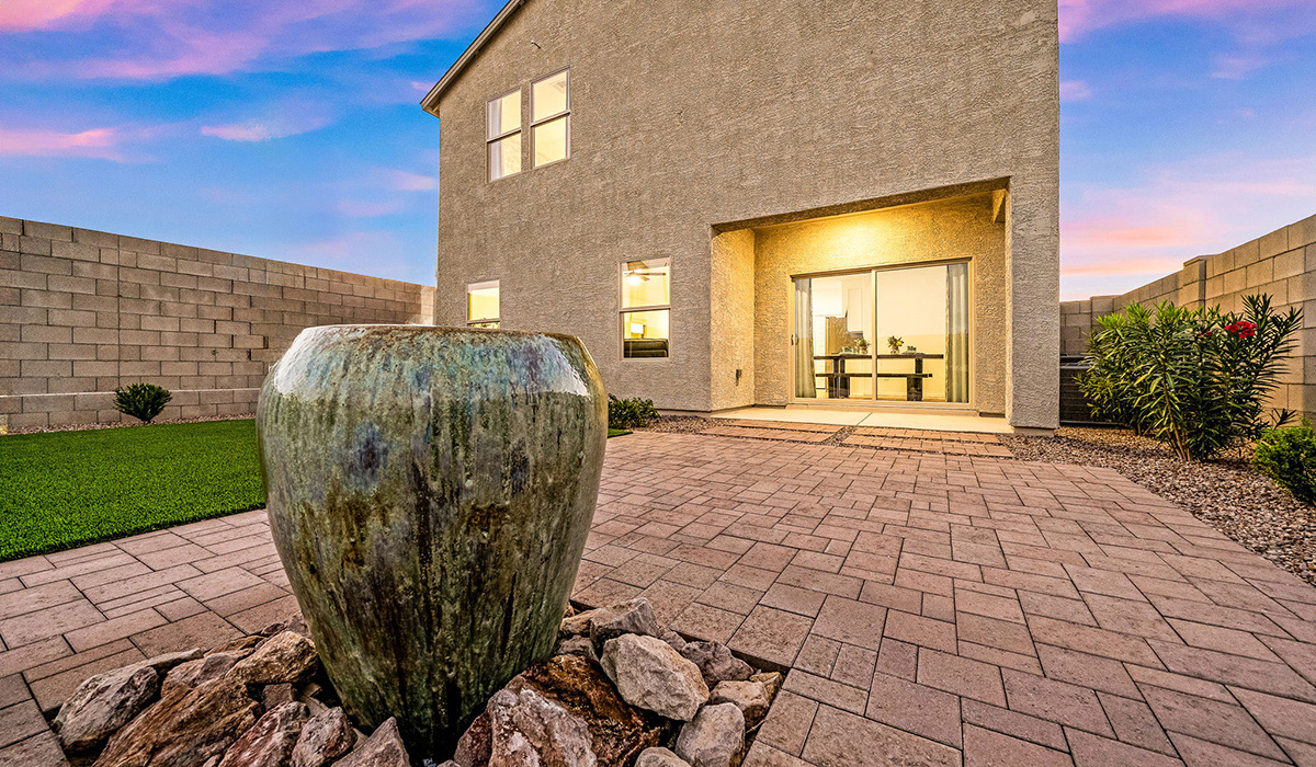 Introducing The Kate, a spacious two-story new home located in the Mesquite neighborhood at Saguaro Bloom, one of Marana's premier communities. This residence, offering 2,264 square feet of living space, is designed to accommodate a variety of lifestyles, with four bedrooms and two and a half bathrooms.  As you enter through the welcoming front porch, you’re immediately drawn into an expansive and open living area. The great room, which flows effortlessly into the dining area and kitchen, serves as the heart of the home, making it perfect for gatherings and everyday living. The kitchen is both functional and stylish, featuring a central island, quartz countertops, and Shaker-style cabinetry. A pantry provides additional storage, keeping your kitchen organized.  Upstairs, The Kate continues to impress with a layout that emphasizes comfort and convenience. The primary bedroom is a peaceful getaway, complete with a walk-in closet and ensuite bathroom. The additional three bedrooms are generously sized and share access to a full bathroom. A dedicated loft provides a flexible space that can be used as a play area, media room, or home office.  The home also includes a powder room on the main level, perfect for guests, and a large utility room upstairs, adding practicality to the daily routine. The covered patio extends your living space outdoors, ideal for enjoying the beautiful Arizona weather.  Built with modern living in mind, The Kate has energy-efficient features, ensuring comfort and sustainability for years to come. Large windows throughout the home allow natural light to brighten every corner, creating a warm and inviting atmosphere.  Situated within the vibrant Saguaro Bloom community, residents have access to many amenities, including swimming pools, walking trails, and parks.   *Images shown are for reference only. They depict the sales model home and may not represent the actual home.