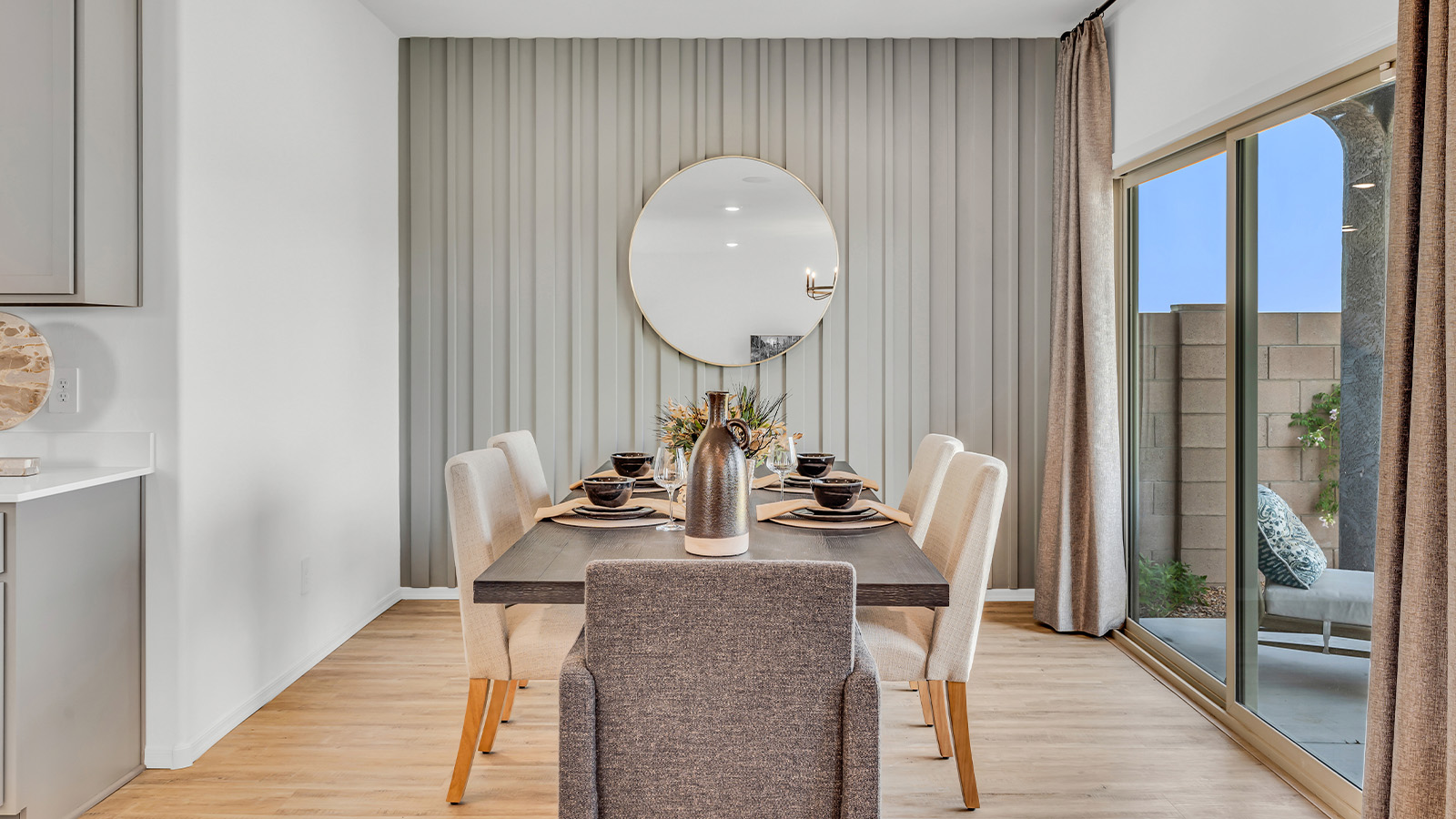 Introducing The Kate, a spacious two-story new home located in the Mesquite neighborhood at Saguaro Bloom, one of Marana's premier communities. This residence, offering 2,264 square feet of living space, is designed to accommodate a variety of lifestyles, with four bedrooms and two and a half bathrooms.  As you enter through the welcoming front porch, you’re immediately drawn into an expansive and open living area. The great room, which flows effortlessly into the dining area and kitchen, serves as the heart of the home, making it perfect for gatherings and everyday living. The kitchen is both functional and stylish, featuring a central island, granite countertops, and Shaker-style cabinetry in your choice of white or gray. A pantry provides additional storage, keeping your kitchen organized and clutter-free.  Upstairs, The Kate continues to impress with a layout that emphasizes comfort and convenience. The primary bedroom is a peaceful getaway, complete with a walk-in closet and a private bathroom featuring dual sinks. The additional three bedrooms are generously sized and share access to a full bathroom. A dedicated game room provides flexible space that can be used as a play area, media room, or home office.  The home also includes a powder room on the main level, perfect for guests, and a large utility room upstairs, adding practicality to the daily routine. The covered patio extends your living space outdoors, ideal for enjoying the beautiful Arizona weather or entertaining guests.  Built with modern living in mind, The Kate incorporates energy-efficient features and smart home technology, ensuring comfort and sustainability for years to come. Large windows throughout the home allow natural light to brighten every corner, creating a warm and inviting atmosphere.  Situated within the vibrant Saguaro Bloom community, residents of The Kate enjoy access to a wealth of amenities, including swimming pools, walking trails, parks, and more. This home offers the perfect blend of style, comfort, and community, making it a standout choice in the Marana area.  *Images shown are for reference only. They depict the sales model home and may not represent the actual home.