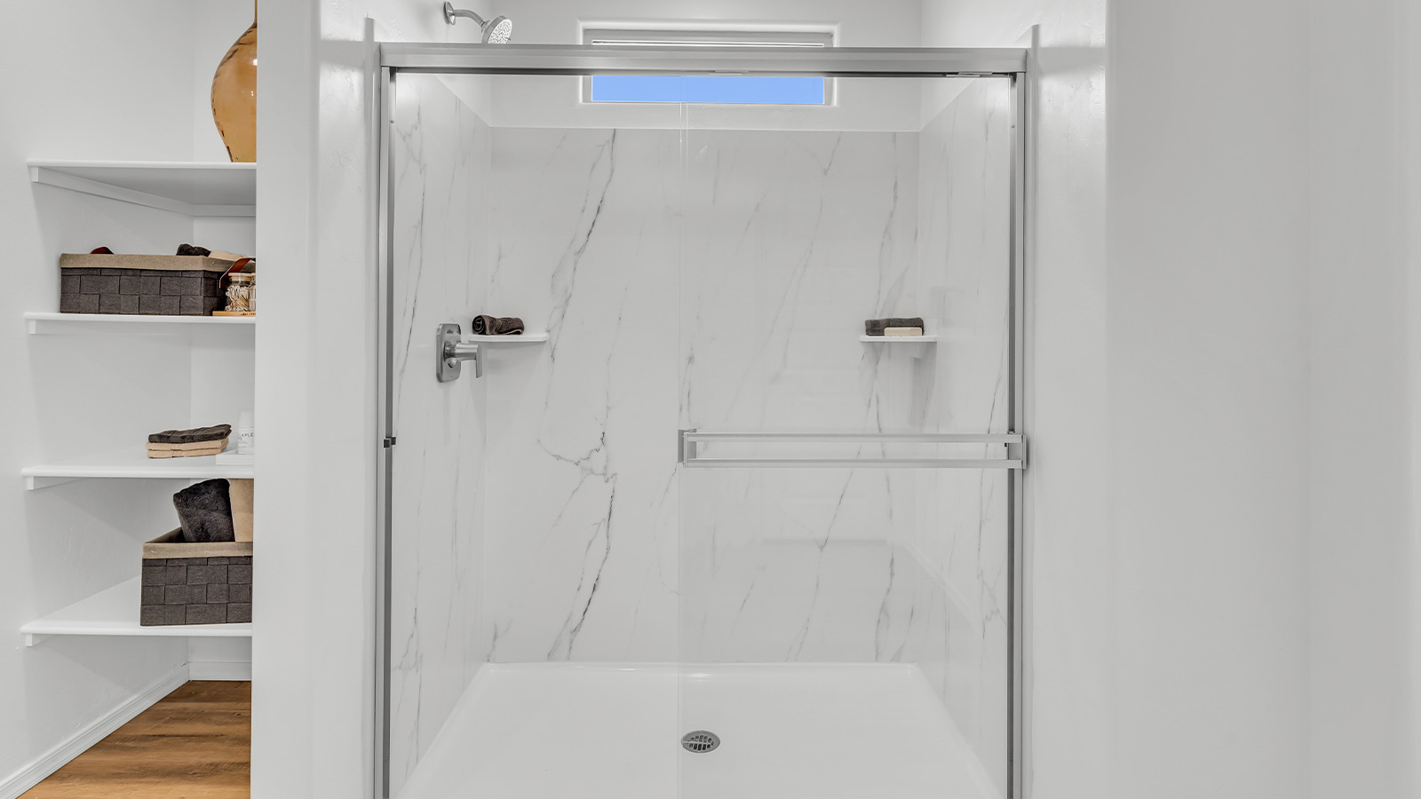 Introducing The Kate, a spacious two-story new home located in the Mesquite neighborhood at Saguaro Bloom, one of Marana's premier communities. This residence, offering 2,264 square feet of living space, is designed to accommodate a variety of lifestyles, with four bedrooms and two and a half bathrooms.  As you enter through the welcoming front porch, you’re immediately drawn into an expansive and open living area. The great room, which flows effortlessly into the dining area and kitchen, serves as the heart of the home, making it perfect for gatherings and everyday living. The kitchen is both functional and stylish, featuring a central island, granite countertops, and Shaker-style cabinetry in your choice of white or gray. A pantry provides additional storage, keeping your kitchen organized and clutter-free.  Upstairs, The Kate continues to impress with a layout that emphasizes comfort and convenience. The primary bedroom is a peaceful getaway, complete with a walk-in closet and a private bathroom featuring dual sinks. The additional three bedrooms are generously sized and share access to a full bathroom. A dedicated game room provides flexible space that can be used as a play area, media room, or home office.  The home also includes a powder room on the main level, perfect for guests, and a large utility room upstairs, adding practicality to the daily routine. The covered patio extends your living space outdoors, ideal for enjoying the beautiful Arizona weather or entertaining guests.  Built with modern living in mind, The Kate incorporates energy-efficient features and smart home technology, ensuring comfort and sustainability for years to come. Large windows throughout the home allow natural light to brighten every corner, creating a warm and inviting atmosphere.  Situated within the vibrant Saguaro Bloom community, residents of The Kate enjoy access to a wealth of amenities, including swimming pools, walking trails, parks, and more. This home offers the perfect blend of style, comfort, and community, making it a standout choice in the Marana area.  *Images shown are for reference only. They depict the sales model home and may not represent the actual home.