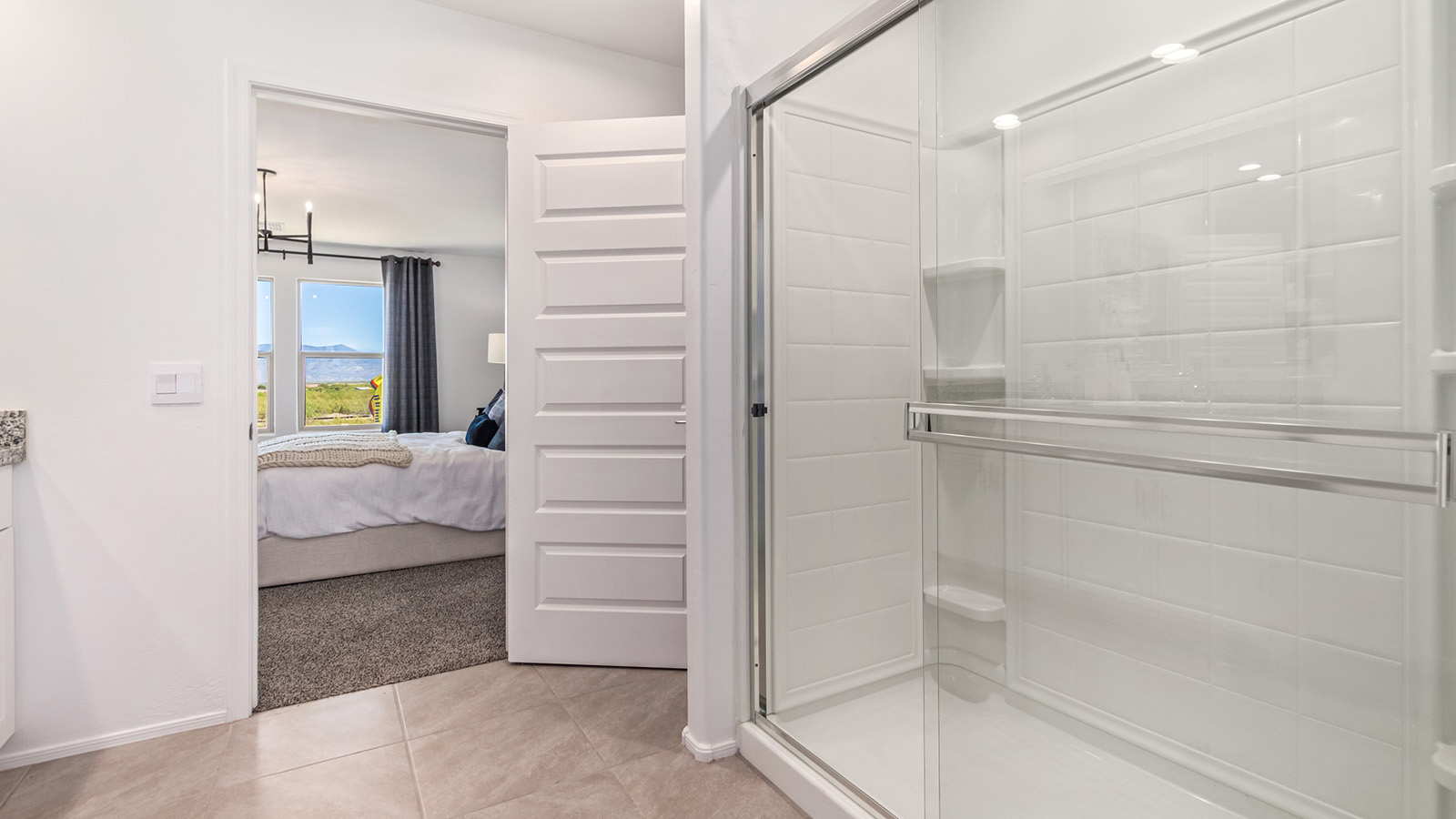 Introducing The Kate, a spacious two-story new home located in the Mesquite neighborhood at Saguaro Bloom, one of Marana's premier communities. This residence, offering 2,264 square feet of living space, is designed to accommodate a variety of lifestyles, with four bedrooms and two and a half bathrooms.  As you enter through the welcoming front porch, you’re immediately drawn into an expansive and open living area. The great room, which flows effortlessly into the dining area and kitchen, serves as the heart of the home, making it perfect for gatherings and everyday living. The kitchen is both functional and stylish, featuring a central island, quartz countertops, and Shaker-style cabinetry. A pantry provides additional storage, keeping your kitchen organized.  Upstairs, The Kate continues to impress with a layout that emphasizes comfort and convenience. The primary bedroom is a peaceful getaway, complete with a walk-in closet and ensuite bathroom. The additional three bedrooms are generously sized and share access to a full bathroom. A dedicated loft provides a flexible space that can be used as a play area, media room, or home office.  The home also includes a powder room on the main level, perfect for guests, and a large utility room upstairs, adding practicality to the daily routine. The covered patio extends your living space outdoors, ideal for enjoying the beautiful Arizona weather.  Built with modern living in mind, The Kate has energy-efficient features, ensuring comfort and sustainability for years to come. Large windows throughout the home allow natural light to brighten every corner, creating a warm and inviting atmosphere.  Situated within the vibrant Saguaro Bloom community, residents have access to many amenities, including swimming pools, walking trails, and parks.   *Images shown are for reference only. They depict the sales model home and may not represent the actual home.