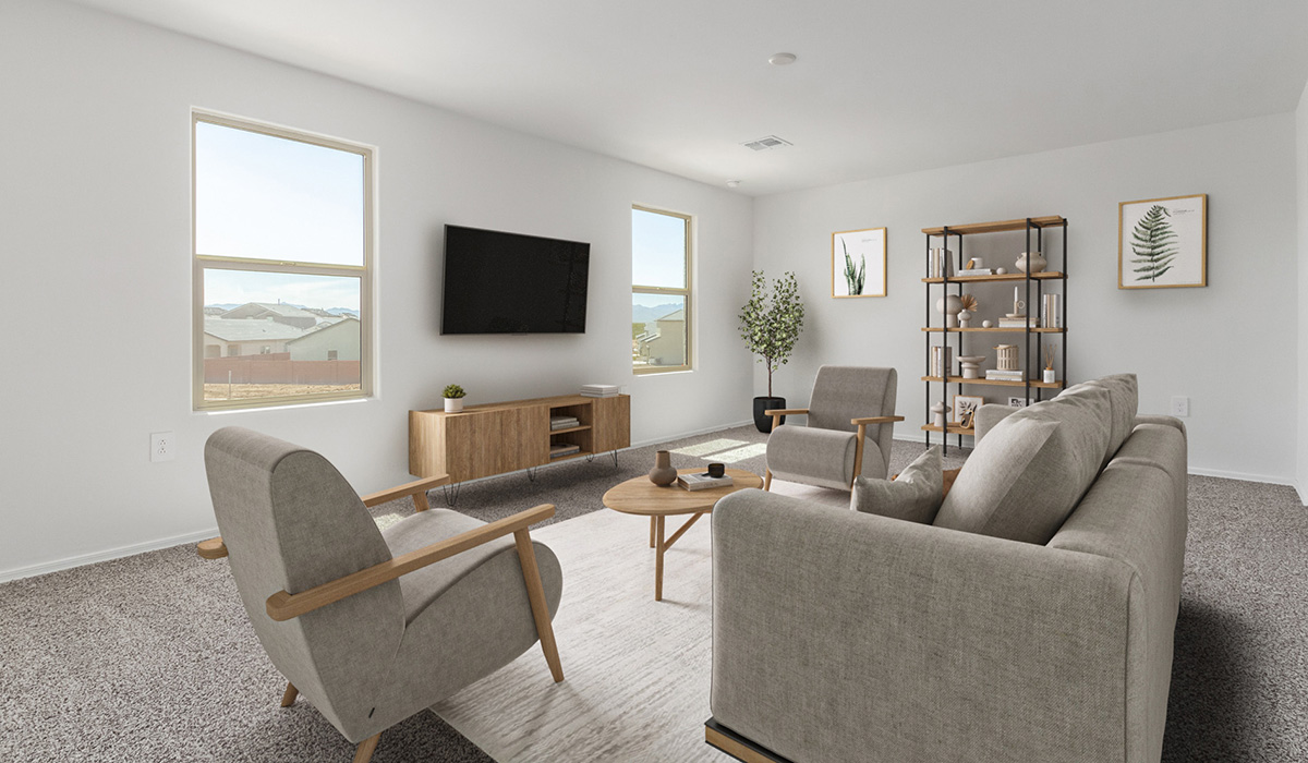 Welcome to The Madison, a generously sized two-story home located in the Mesquite neighborhood of Saguaro Bloom. With 2,522 square feet of living space, this home is designed to accommodate a variety of lifestyles, featuring five bedrooms and three full bathrooms.  As you step into the charming front porch, you are greeted by a spacious and open floor plan that seamlessly connects the main living areas. The great room serves as the central hub of the home, flowing into a dining area and modern kitchen area. The kitchen features a large central island, quartz countertops, Shaker-style cabinetry, walk-in pantry, and ample storage for all your culinary needs.  The first floor also includes a guest bedroom and a full bathroom, offering convenience and flexibility for visitors or family members.   Upstairs, The Madison continues to impress with a thoughtful layout that includes four additional bedrooms. The primary bedroom offers plenty of space ensuite a private bathroom and large walk-in closet. The loft area provides an additional living space that can be used as a game room, media center, or study, adding versatility to the home’s design.  A covered patio extends your living space outdoors, making it the perfect spot for enjoying the Arizona weather, whether you’re hosting a gathering or relaxing in the evening. The two-car garage provides ample space for vehicles and additional storage.  The Madison is equipped with modern, energy-efficient features and smart home technology, ensuring a comfortable and sustainable lifestyle for years to come. Large windows throughout the home allow natural light to fill the space, creating a warm and welcoming atmosphere.  Located in the vibrant Saguaro Bloom community, The Madison offers access to a wide range of amenities, including swimming pools, walking trails, parks, and more. This home combines style, comfort, and functionality, making it an excellent choice for those looking to settle in Marana.