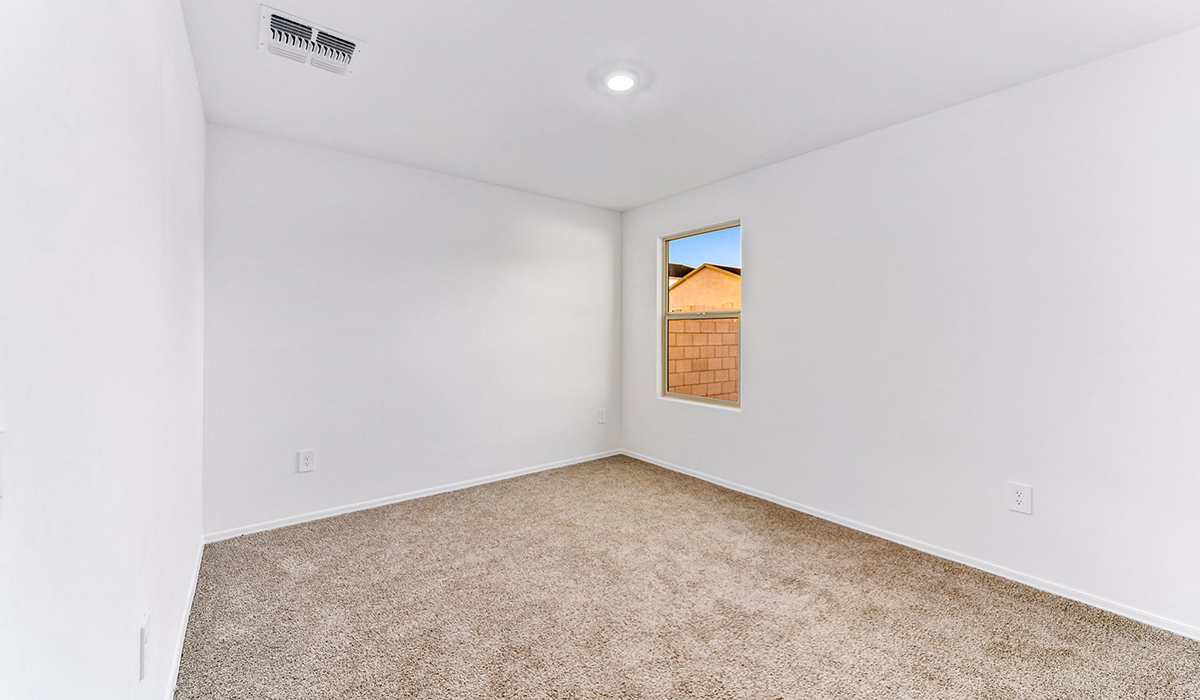 Welcome to The Madison, a generously sized two-story home located in the Mesquite neighborhood of Saguaro Bloom. With 2,522 square feet of living space, this home is designed to accommodate a variety of lifestyles, featuring five bedrooms and three full bathrooms.  As you step into the charming front porch, you are greeted by a spacious and open floor plan that seamlessly connects the main living areas. The great room serves as the central hub of the home, flowing into a dining area and modern kitchen area. The kitchen features a large central island, quartz countertops, Shaker-style cabinetry, walk-in pantry, and ample storage for all your culinary needs.  The first floor also includes a guest bedroom and a full bathroom, offering convenience and flexibility for visitors or family members.   Upstairs, The Madison continues to impress with a thoughtful layout that includes four additional bedrooms. The primary bedroom offers plenty of space ensuite a private bathroom and large walk-in closet. The loft area provides an additional living space that can be used as a game room, media center, or study, adding versatility to the home’s design.  A covered patio extends your living space outdoors, making it the perfect spot for enjoying the Arizona weather, whether you’re hosting a gathering or relaxing in the evening. The two-car garage provides ample space for vehicles and additional storage.  The Madison is equipped with modern, energy-efficient features and smart home technology, ensuring a comfortable and sustainable lifestyle for years to come. Large windows throughout the home allow natural light to fill the space, creating a warm and welcoming atmosphere.  Located in the vibrant Saguaro Bloom community, The Madison offers access to a wide range of amenities, including swimming pools, walking trails, parks, and more. This home combines style, comfort, and functionality, making it an excellent choice for those looking to settle in Marana.  *Images shown are for reference only. They depict the Madison model home and may not represent the actual home.