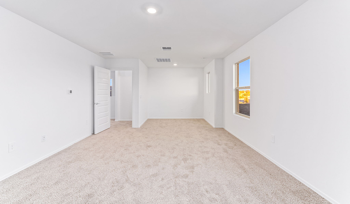 Welcome to The Madison, a generously sized two-story home located in the Mesquite neighborhood of Saguaro Bloom. With 2,522 square feet of living space, this home is designed to accommodate a variety of lifestyles, featuring five bedrooms and three full bathrooms.  As you step into the charming front porch, you are greeted by a spacious and open floor plan that seamlessly connects the main living areas. The great room serves as the central hub of the home, flowing into a dining area and modern kitchen area. The kitchen features a large central island, quartz countertops, Shaker-style cabinetry, walk-in pantry, and ample storage for all your culinary needs.  The first floor also includes a guest bedroom and a full bathroom, offering convenience and flexibility for visitors or family members.   Upstairs, The Madison continues to impress with a thoughtful layout that includes four additional bedrooms. The primary bedroom offers plenty of space ensuite a private bathroom and large walk-in closet. The loft area provides an additional living space that can be used as a game room, media center, or study, adding versatility to the home’s design.  A covered patio extends your living space outdoors, making it the perfect spot for enjoying the Arizona weather, whether you’re hosting a gathering or relaxing in the evening. The two-car garage provides ample space for vehicles and additional storage.  The Madison is equipped with modern, energy-efficient features and smart home technology, ensuring a comfortable and sustainable lifestyle for years to come. Large windows throughout the home allow natural light to fill the space, creating a warm and welcoming atmosphere.  Located in the vibrant Saguaro Bloom community, The Madison offers access to a wide range of amenities, including swimming pools, walking trails, parks, and more. This home combines style, comfort, and functionality, making it an excellent choice for those looking to settle in Marana.  *Images shown are for reference only. They depict the Madison model home and may not represent the actual home.