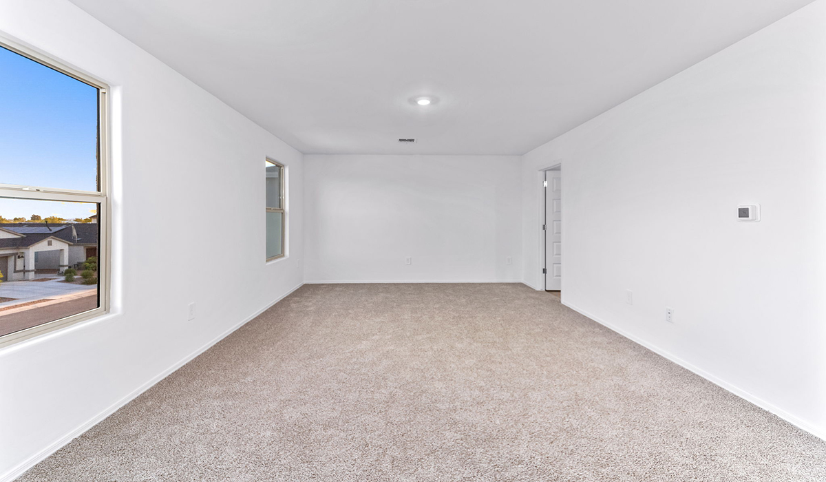 Welcome to The Madison, a generously sized two-story home located in the Mesquite neighborhood of Saguaro Bloom. With 2,522 square feet of living space, this home is designed to accommodate a variety of lifestyles, featuring five bedrooms and three full bathrooms.  As you step into the charming front porch, you are greeted by a spacious and open floor plan that seamlessly connects the main living areas. The great room serves as the central hub of the home, flowing into a dining area and modern kitchen area. The kitchen features a large central island, quartz countertops, Shaker-style cabinetry, walk-in pantry, and ample storage for all your culinary needs.  The first floor also includes a guest bedroom and a full bathroom, offering convenience and flexibility for visitors or family members.   Upstairs, The Madison continues to impress with a thoughtful layout that includes four additional bedrooms. The primary bedroom offers plenty of space ensuite a private bathroom and large walk-in closet. The loft area provides an additional living space that can be used as a game room, media center, or study, adding versatility to the home’s design.  A covered patio extends your living space outdoors, making it the perfect spot for enjoying the Arizona weather, whether you’re hosting a gathering or relaxing in the evening. The two-car garage provides ample space for vehicles and additional storage.  The Madison is equipped with modern, energy-efficient features and smart home technology, ensuring a comfortable and sustainable lifestyle for years to come. Large windows throughout the home allow natural light to fill the space, creating a warm and welcoming atmosphere.  Located in the vibrant Saguaro Bloom community, The Madison offers access to a wide range of amenities, including swimming pools, walking trails, parks, and more. This home combines style, comfort, and functionality, making it an excellent choice for those looking to settle in Marana.  *Images shown are for reference only. They depict the Madison model home and may not represent the actual home.