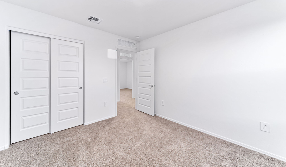 Welcome to The Madison, a generously sized two-story home located in the Mesquite neighborhood of Saguaro Bloom. With 2,522 square feet of living space, this home is designed to accommodate a variety of lifestyles, featuring five bedrooms and three full bathrooms.  As you step into the charming front porch, you are greeted by a spacious and open floor plan that seamlessly connects the main living areas. The great room serves as the central hub of the home, flowing into a dining area and modern kitchen area. The kitchen features a large central island, quartz countertops, Shaker-style cabinetry, walk-in pantry, and ample storage for all your culinary needs.  The first floor also includes a guest bedroom and a full bathroom, offering convenience and flexibility for visitors or family members.   Upstairs, The Madison continues to impress with a thoughtful layout that includes four additional bedrooms. The primary bedroom offers plenty of space ensuite a private bathroom and large walk-in closet. The loft area provides an additional living space that can be used as a game room, media center, or study, adding versatility to the home’s design.  A covered patio extends your living space outdoors, making it the perfect spot for enjoying the Arizona weather, whether you’re hosting a gathering or relaxing in the evening. The two-car garage provides ample space for vehicles and additional storage.  The Madison is equipped with modern, energy-efficient features and smart home technology, ensuring a comfortable and sustainable lifestyle for years to come. Large windows throughout the home allow natural light to fill the space, creating a warm and welcoming atmosphere.  Located in the vibrant Saguaro Bloom community, The Madison offers access to a wide range of amenities, including swimming pools, walking trails, parks, and more. This home combines style, comfort, and functionality, making it an excellent choice for those looking to settle in Marana.  *Images shown are for reference only. They depict the Madison model home and may not represent the actual home.