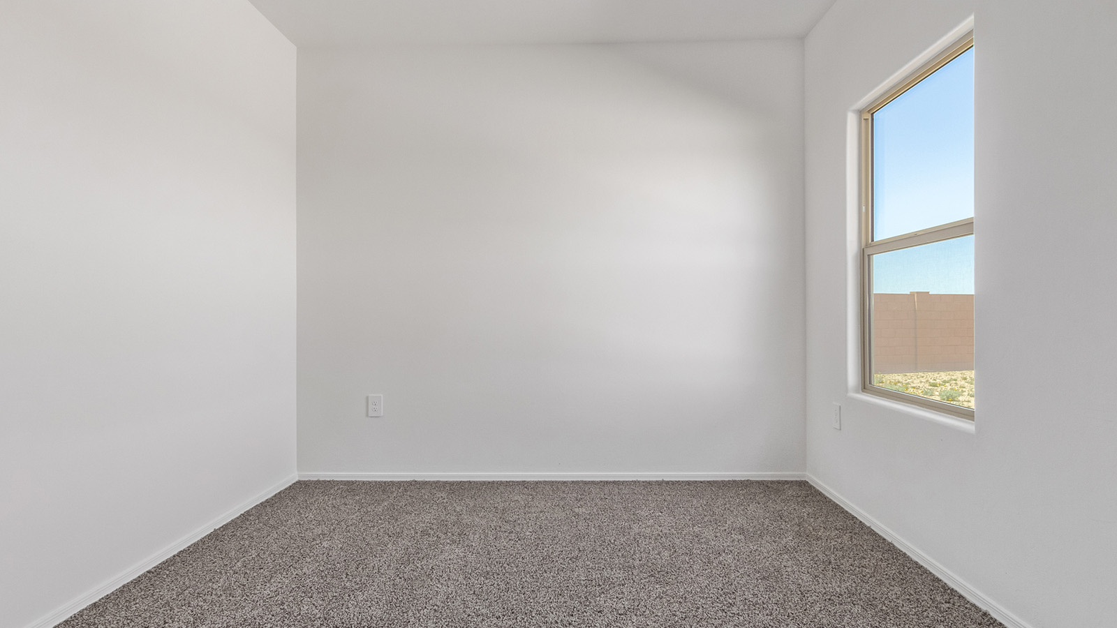 Welcome to The Madison, a generously sized two-story home located in the Mesquite neighborhood of Saguaro Bloom. With 2,522 square feet of living space, this home is designed to accommodate a variety of lifestyles, featuring five bedrooms and three full bathrooms.  As you step into the charming front porch, you are greeted by a spacious and open floor plan that seamlessly connects the main living areas. The great room serves as the central hub of the home, flowing into a dining area and modern kitchen area. The kitchen features a large central island, quartz countertops, Shaker-style cabinetry, walk-in pantry, and ample storage for all your culinary needs.  The first floor also includes a guest bedroom and a full bathroom, offering convenience and flexibility for visitors or family members.   Upstairs, The Madison continues to impress with a thoughtful layout that includes four additional bedrooms. The primary bedroom offers plenty of space ensuite a private bathroom and large walk-in closet. The loft area provides an additional living space that can be used as a game room, media center, or study, adding versatility to the home’s design.  A covered patio extends your living space outdoors, making it the perfect spot for enjoying the Arizona weather, whether you’re hosting a gathering or relaxing in the evening. The two-car garage provides ample space for vehicles and additional storage.  The Madison is equipped with modern, energy-efficient features and smart home technology, ensuring a comfortable and sustainable lifestyle for years to come. Large windows throughout the home allow natural light to fill the space, creating a warm and welcoming atmosphere.  Located in the vibrant Saguaro Bloom community, The Madison offers access to a wide range of amenities, including swimming pools, walking trails, parks, and more. This home combines style, comfort, and functionality, making it an excellent choice for those looking to settle in Marana.