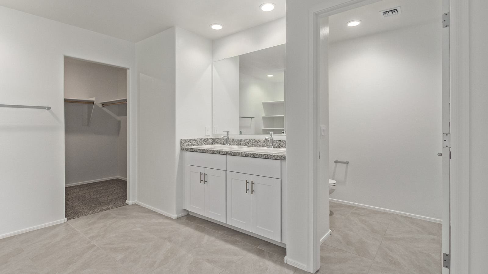 Welcome to The Madison, a generously sized two-story home located in the Mesquite neighborhood of Saguaro Bloom. With 2,522 square feet of living space, this home is designed to accommodate a variety of lifestyles, featuring five bedrooms and three full bathrooms.  As you step into the charming front porch, you are greeted by a spacious and open floor plan that seamlessly connects the main living areas. The great room serves as the central hub of the home, flowing into a dining area and modern kitchen area. The kitchen features a large central island, quartz countertops, Shaker-style cabinetry, walk-in pantry, and ample storage for all your culinary needs.  The first floor also includes a guest bedroom and a full bathroom, offering convenience and flexibility for visitors or family members.   Upstairs, The Madison continues to impress with a thoughtful layout that includes four additional bedrooms. The primary bedroom offers plenty of space ensuite a private bathroom and large walk-in closet. The loft area provides an additional living space that can be used as a game room, media center, or study, adding versatility to the home’s design.  A covered patio extends your living space outdoors, making it the perfect spot for enjoying the Arizona weather, whether you’re hosting a gathering or relaxing in the evening. The two-car garage provides ample space for vehicles and additional storage.  The Madison is equipped with modern, energy-efficient features and smart home technology, ensuring a comfortable and sustainable lifestyle for years to come. Large windows throughout the home allow natural light to fill the space, creating a warm and welcoming atmosphere.  Located in the vibrant Saguaro Bloom community, The Madison offers access to a wide range of amenities, including swimming pools, walking trails, parks, and more. This home combines style, comfort, and functionality, making it an excellent choice for those looking to settle in Marana.