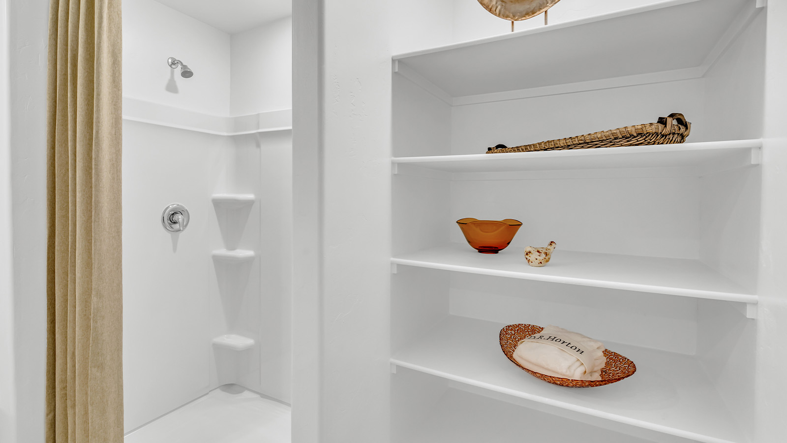 Welcome to the Gaven plan, a spacious single-story new home within Saguaro Bloom, where modern living meets the serene beauty of the Arizona landscape. This thoughtfully crafted residence offers 1,815 square feet of well-designed living space, featuring four bedrooms and two full bathrooms, perfect for families who value both comfort and style. As you step through the front door, you’ll be greeted by a bright and airy entryway that seamlessly transitions into the heart of the home. The open layout connects the great room, dining area, and kitchen, creating an ideal environment for both everyday living and entertaining. The kitchen is a culinary haven, equipped with state-of-the-art appliances, a spacious pantry, and elegant quartz countertops that extend to a large island, perfect for meal prep or casual dining.  The master suite, nestled at the rear of the home, offers a peaceful retreat with a generously sized walk-in closet and a luxurious en-suite bathroom. The additional three bedrooms are strategically placed to provide privacy and convenience, making them perfect for children, guests, or even a home office. Outside, the covered patio extends your living space into the beautifully landscaped backyard, ideal for enjoying Arizona’s stunning sunsets. The front yard is also fully landscaped and equipped with an auto drip irrigation system, ensuring your home’s curb appeal is maintained with ease.  Each home within Saguaro Bloom, including the Gaven plan, is outfitted with D.R. Horton’s Home is Connected® Smart Home package, featuring a smart thermostat, video doorbell, keyless entry, and Wi-Fi-enabled garage door opener. Energy efficiency is a cornerstone of the design, with features like spray foam insulation, tankless water heaters, and LED lighting, all contributing to long-term savings and environmental sustainability.  Saguaro Bloom isn’t just a place to live; it’s a vibrant community with a wealth of amenities, from scenic walking trails to pools and playgrounds, ensuring that there’s always something for everyone. Embrace the lifestyle you’ve always dreamed of in the Gaven plan—a perfect blend of comfort, convenience, and Arizona charm