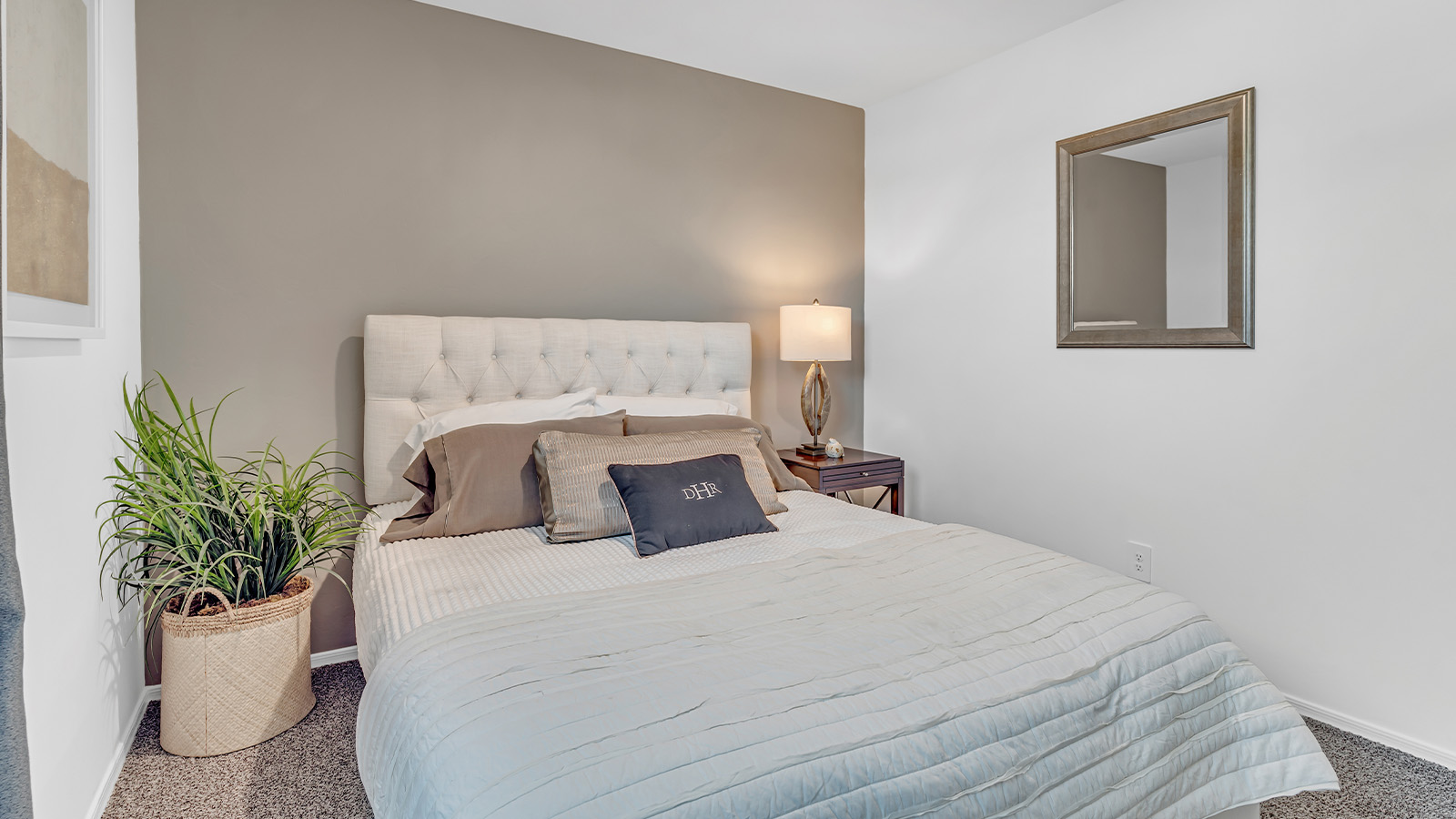 Welcome to the Gaven plan, a spacious single-story new home within Saguaro Bloom, where modern living meets the serene beauty of the Arizona landscape. This thoughtfully crafted residence offers 1,815 square feet of well-designed living space, featuring four bedrooms and two full bathrooms, perfect for families who value both comfort and style. As you step through the front door, you’ll be greeted by a bright and airy entryway that seamlessly transitions into the heart of the home. The open layout connects the great room, dining area, and kitchen, creating an ideal environment for both everyday living and entertaining. The kitchen is a culinary haven, equipped with state-of-the-art appliances, a spacious pantry, and elegant quartz countertops that extend to a large island, perfect for meal prep or casual dining.  The master suite, nestled at the rear of the home, offers a peaceful retreat with a generously sized walk-in closet and a luxurious en-suite bathroom. The additional three bedrooms are strategically placed to provide privacy and convenience, making them perfect for children, guests, or even a home office. Outside, the covered patio extends your living space into the beautifully landscaped backyard, ideal for enjoying Arizona’s stunning sunsets. The front yard is also fully landscaped and equipped with an auto drip irrigation system, ensuring your home’s curb appeal is maintained with ease.  Each home within Saguaro Bloom, including the Gaven plan, is outfitted with D.R. Horton’s Home is Connected® Smart Home package, featuring a smart thermostat, video doorbell, keyless entry, and Wi-Fi-enabled garage door opener. Energy efficiency is a cornerstone of the design, with features like spray foam insulation, tankless water heaters, and LED lighting, all contributing to long-term savings and environmental sustainability.  Saguaro Bloom isn’t just a place to live; it’s a vibrant community with a wealth of amenities, from scenic walking trails to pools and playgrounds, ensuring that there’s always something for everyone. Embrace the lifestyle you’ve always dreamed of in the Gaven plan—a perfect blend of comfort, convenience, and Arizona charm