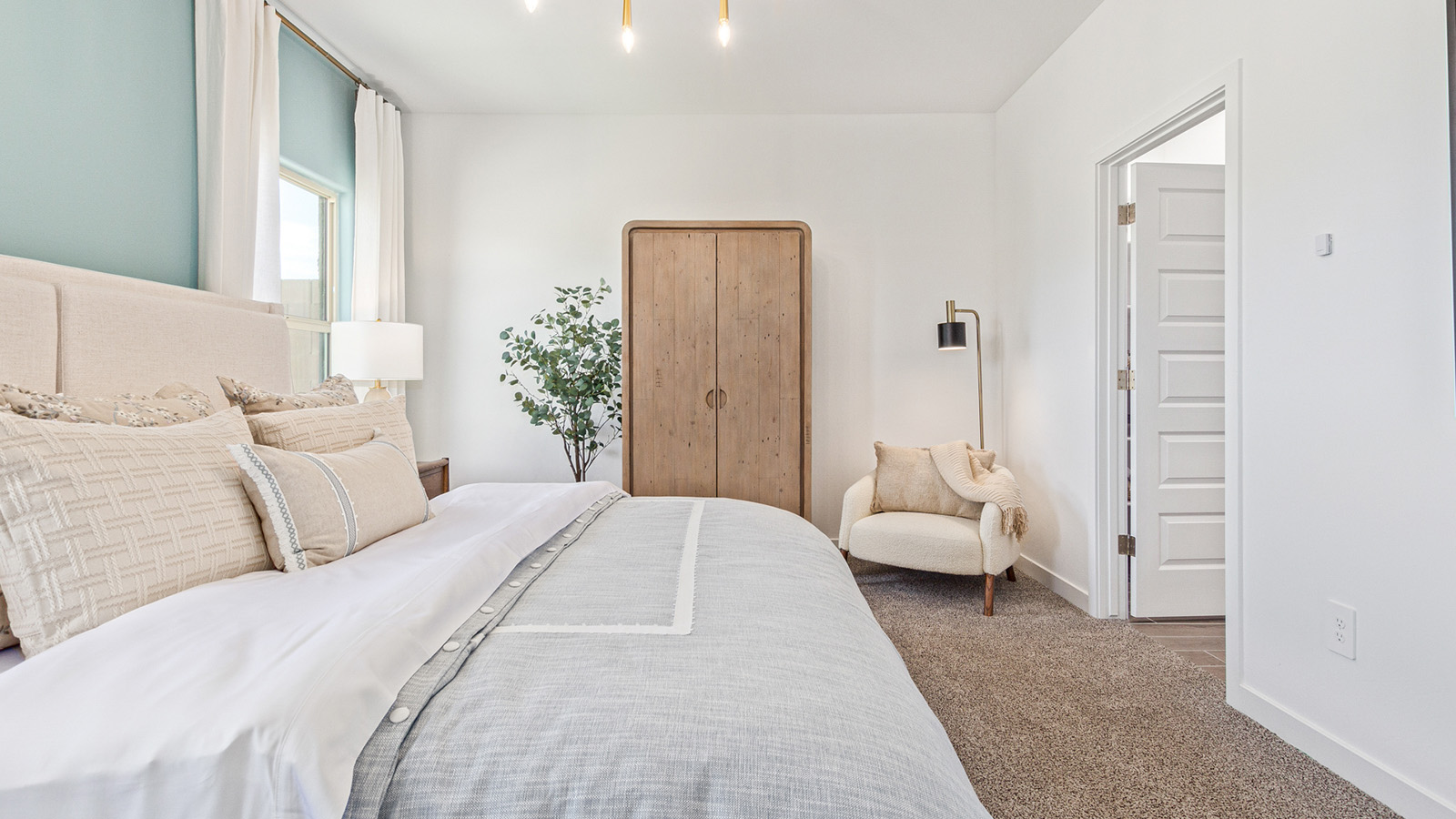 Welcome to The Gaven plan, a spacious single-story within Saguaro Bloom, where modern living meets the serene beauty of the Arizona landscape. This thoughtfully crafted layout offers 1,815 square feet of well-designed living space, featuring four bedrooms and two full bathrooms, perfect for families who value both comfort and style.  As you enter the home, you’ll be greeted by a bright and airy entryway that seamlessly transitions into the heart of the home. The open layout connects the great room, dining area, and kitchen area. The kitchen is a culinary haven, equipped with state-of-the-art appliances, a spacious pantry, and elegant quartz countertops that extend to a large island, perfect for meal prep or casual dining.  The primary suite, nestled at the rear of the home, offers a peaceful retreat with a generously sized walk-in closet and a luxurious en-suite bathroom. The additional three bedrooms are strategically placed to provide privacy and convenience, making them perfect for children, guests, or even a home office. Outside, the covered patio extends your living space, ideal for enjoying Arizona’s stunning sunsets. The front yard is fully landscaped and equipped with an auto drip irrigation system, ensuring your home’s curb appeal is maintained with ease.  Each home within Saguaro Bloom, is outfitted with D.R. Horton’s Home is Connected® Smart Home package, featuring a smart thermostat, video doorbell, keyless entry, and Wi-Fi-enabled garage door opener. Energy efficiency is a cornerstone of the design, with features like spray foam insulation, tankless water heater, and LED lighting, all contributing to long-term savings and environmental sustainability.  Saguaro Bloom is a vibrant community with a wealth of amenities, from scenic walking trails to pools and playgrounds, ensuring that there’s always something for everyone. Embrace the lifestyle you’ve always dreamed of in The Gaven — a perfect blend of comfort, convenience, and Arizona charm.  *Images shown are for reference only. They depict the sales model home and may not represent the actual home.