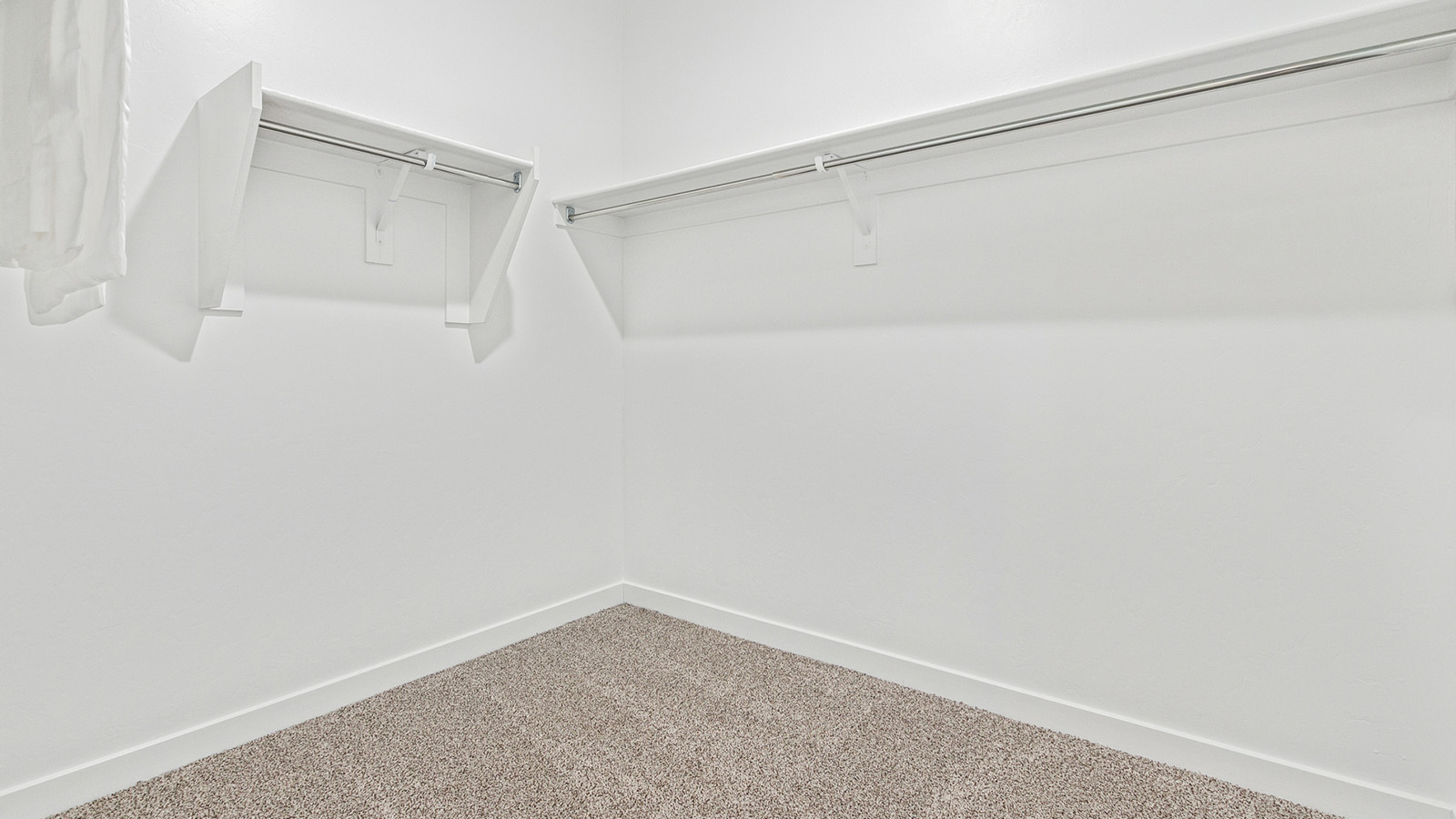 Welcome to The Gaven plan, a spacious single-story within Saguaro Bloom, where modern living meets the serene beauty of the Arizona landscape. This thoughtfully crafted layout offers 1,815 square feet of well-designed living space, featuring four bedrooms and two full bathrooms, perfect for families who value both comfort and style.  As you enter the home, you’ll be greeted by a bright and airy entryway that seamlessly transitions into the heart of the home. The open layout connects the great room, dining area, and kitchen area. The kitchen is a culinary haven, equipped with state-of-the-art appliances, a spacious pantry, and elegant quartz countertops that extend to a large island, perfect for meal prep or casual dining.  The primary suite, nestled at the rear of the home, offers a peaceful retreat with a generously sized walk-in closet and a luxurious en-suite bathroom. The additional three bedrooms are strategically placed to provide privacy and convenience, making them perfect for children, guests, or even a home office. Outside, the covered patio extends your living space, ideal for enjoying Arizona’s stunning sunsets. The front yard is fully landscaped and equipped with an auto drip irrigation system, ensuring your home’s curb appeal is maintained with ease.  Each home within Saguaro Bloom, is outfitted with D.R. Horton’s Home is Connected® Smart Home package, featuring a smart thermostat, video doorbell, keyless entry, and Wi-Fi-enabled garage door opener. Energy efficiency is a cornerstone of the design, with features like spray foam insulation, tankless water heater, and LED lighting, all contributing to long-term savings and environmental sustainability.  Saguaro Bloom is a vibrant community with a wealth of amenities, from scenic walking trails to pools and playgrounds, ensuring that there’s always something for everyone. Embrace the lifestyle you’ve always dreamed of in The Gaven — a perfect blend of comfort, convenience, and Arizona charm.  *Images shown are for reference only. They depict the sales model home and may not represent the actual home.