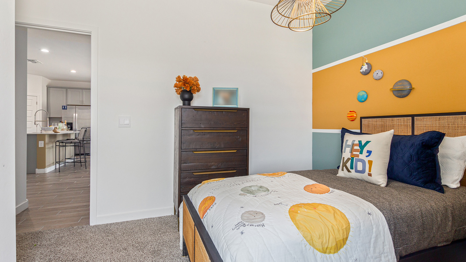 Welcome to The Gaven plan, a spacious single-story within Saguaro Bloom, where modern living meets the serene beauty of the Arizona landscape. This thoughtfully crafted layout offers 1,815 square feet of well-designed living space, featuring four bedrooms and two full bathrooms, perfect for families who value both comfort and style.  As you enter the home, you’ll be greeted by a bright and airy entryway that seamlessly transitions into the heart of the home. The open layout connects the great room, dining area, and kitchen area. The kitchen is a culinary haven, equipped with state-of-the-art appliances, a spacious pantry, and elegant quartz countertops that extend to a large island, perfect for meal prep or casual dining.  The primary suite, nestled at the rear of the home, offers a peaceful retreat with a generously sized walk-in closet and a luxurious en-suite bathroom. The additional three bedrooms are strategically placed to provide privacy and convenience, making them perfect for children, guests, or even a home office. Outside, the covered patio extends your living space, ideal for enjoying Arizona’s stunning sunsets. The front yard is fully landscaped and equipped with an auto drip irrigation system, ensuring your home’s curb appeal is maintained with ease.  Each home within Saguaro Bloom, is outfitted with D.R. Horton’s Home is Connected® Smart Home package, featuring a smart thermostat, video doorbell, keyless entry, and Wi-Fi-enabled garage door opener. Energy efficiency is a cornerstone of the design, with features like spray foam insulation, tankless water heater, and LED lighting, all contributing to long-term savings and environmental sustainability.  Saguaro Bloom is a vibrant community with a wealth of amenities, from scenic walking trails to pools and playgrounds, ensuring that there’s always something for everyone. Embrace the lifestyle you’ve always dreamed of in The Gaven — a perfect blend of comfort, convenience, and Arizona charm.  *Images shown are for reference only. They depict the sales model home and may not represent the actual home.