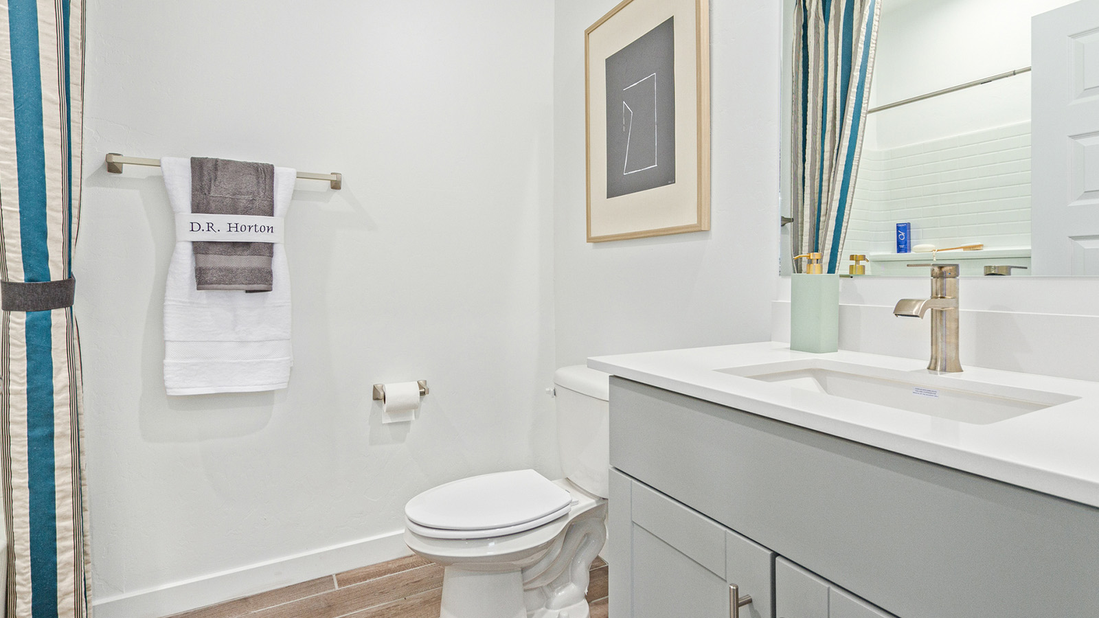 Welcome to The Gaven plan, a spacious single-story within Saguaro Bloom, where modern living meets the serene beauty of the Arizona landscape. This thoughtfully crafted layout offers 1,815 square feet of well-designed living space, featuring four bedrooms and two full bathrooms, perfect for families who value both comfort and style.  As you enter the home, you’ll be greeted by a bright and airy entryway that seamlessly transitions into the heart of the home. The open layout connects the great room, dining area, and kitchen area. The kitchen is a culinary haven, equipped with state-of-the-art appliances, a spacious pantry, and elegant quartz countertops that extend to a large island, perfect for meal prep or casual dining.  The primary suite, nestled at the rear of the home, offers a peaceful retreat with a generously sized walk-in closet and a luxurious en-suite bathroom. The additional three bedrooms are strategically placed to provide privacy and convenience, making them perfect for children, guests, or even a home office. Outside, the covered patio extends your living space, ideal for enjoying Arizona’s stunning sunsets. The front yard is fully landscaped and equipped with an auto drip irrigation system, ensuring your home’s curb appeal is maintained with ease.  Each home within Saguaro Bloom, is outfitted with D.R. Horton’s Home is Connected® Smart Home package, featuring a smart thermostat, video doorbell, keyless entry, and Wi-Fi-enabled garage door opener. Energy efficiency is a cornerstone of the design, with features like spray foam insulation, tankless water heater, and LED lighting, all contributing to long-term savings and environmental sustainability.  Saguaro Bloom is a vibrant community with a wealth of amenities, from scenic walking trails to pools and playgrounds, ensuring that there’s always something for everyone. Embrace the lifestyle you’ve always dreamed of in The Gaven — a perfect blend of comfort, convenience, and Arizona charm.  *Images shown are for reference only. They depict the Gaven model home and may not represent the actual home.