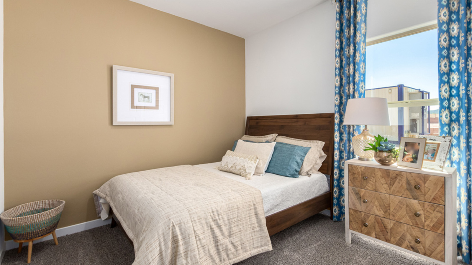 Welcome to The Gaven plan, a spacious single-story within Saguaro Bloom, where modern living meets the serene beauty of the Arizona landscape. This thoughtfully crafted layout offers 1,815 square feet of well-designed living space, featuring four bedrooms and two full bathrooms, perfect for families who value both comfort and style.  As you enter the home, you’ll be greeted by a bright and airy entryway that seamlessly transitions into the heart of the home. The open layout connects the great room, dining area, and kitchen area. The kitchen is a culinary haven, equipped with state-of-the-art appliances, a spacious pantry, and elegant quartz countertops that extend to a large island, perfect for meal prep or casual dining.  The primary suite, nestled at the rear of the home, offers a peaceful retreat with a generously sized walk-in closet and a luxurious en-suite bathroom. The additional three bedrooms are strategically placed to provide privacy and convenience, making them perfect for children, guests, or even a home office. Outside, the covered patio extends your living space, ideal for enjoying Arizona’s stunning sunsets. The front yard is fully landscaped and equipped with an auto drip irrigation system, ensuring your home’s curb appeal is maintained with ease.  Each home within Saguaro Bloom, is outfitted with D.R. Horton’s Home is Connected® Smart Home package, featuring a smart thermostat, video doorbell, keyless entry, and Wi-Fi-enabled garage door opener. Energy efficiency is a cornerstone of the design, with features like spray foam insulation, tankless water heater, and LED lighting, all contributing to long-term savings and environmental sustainability.  Saguaro Bloom is a vibrant community with a wealth of amenities, from scenic walking trails to pools and playgrounds, ensuring that there’s always something for everyone. Embrace the lifestyle you’ve always dreamed of in The Gaven — a perfect blend of comfort, convenience, and Arizona charm.  *Images shown are for reference only. They depict the Gaven Model home and may not represent the actual home.