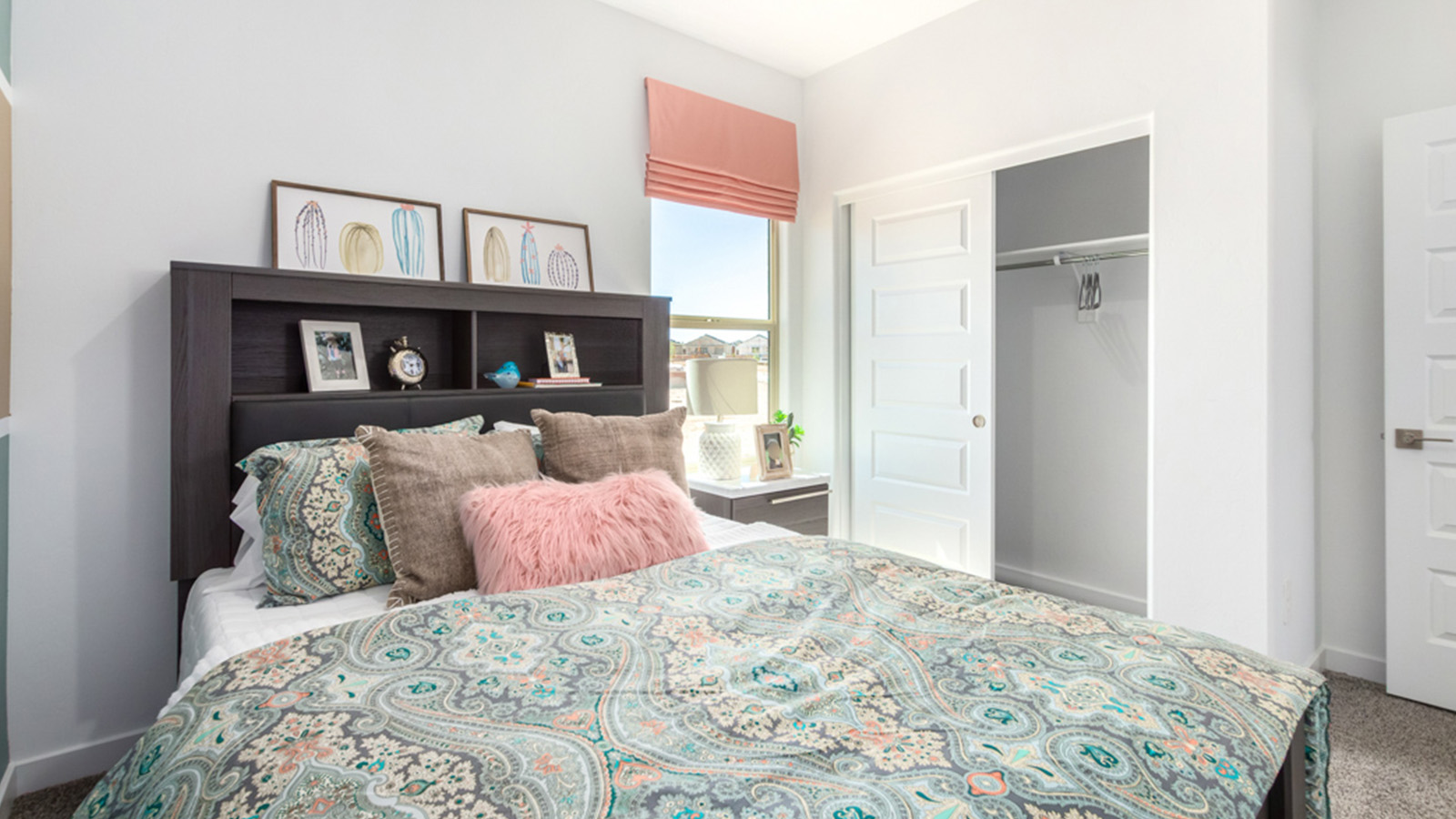 Welcome to The Gaven plan, a spacious single-story within Saguaro Bloom, where modern living meets the serene beauty of the Arizona landscape. This thoughtfully crafted layout offers 1,815 square feet of well-designed living space, featuring four bedrooms and two full bathrooms, perfect for families who value both comfort and style.  As you enter the home, you’ll be greeted by a bright and airy entryway that seamlessly transitions into the heart of the home. The open layout connects the great room, dining area, and kitchen area. The kitchen is a culinary haven, equipped with state-of-the-art appliances, a spacious pantry, and elegant quartz countertops that extend to a large island, perfect for meal prep or casual dining.  The primary suite, nestled at the rear of the home, offers a peaceful retreat with a generously sized walk-in closet and a luxurious en-suite bathroom. The additional three bedrooms are strategically placed to provide privacy and convenience, making them perfect for children, guests, or even a home office. Outside, the covered patio extends your living space, ideal for enjoying Arizona’s stunning sunsets. The front yard is fully landscaped and equipped with an auto drip irrigation system, ensuring your home’s curb appeal is maintained with ease.  Each home within Saguaro Bloom, is outfitted with D.R. Horton’s Home is Connected® Smart Home package, featuring a smart thermostat, video doorbell, keyless entry, and Wi-Fi-enabled garage door opener. Energy efficiency is a cornerstone of the design, with features like spray foam insulation, tankless water heater, and LED lighting, all contributing to long-term savings and environmental sustainability.  Saguaro Bloom is a vibrant community with a wealth of amenities, from scenic walking trails to pools and playgrounds, ensuring that there’s always something for everyone. Embrace the lifestyle you’ve always dreamed of in The Gaven — a perfect blend of comfort, convenience, and Arizona charm.  *Images shown are for reference only. They depict the Gaven Model home and may not represent the actual home.