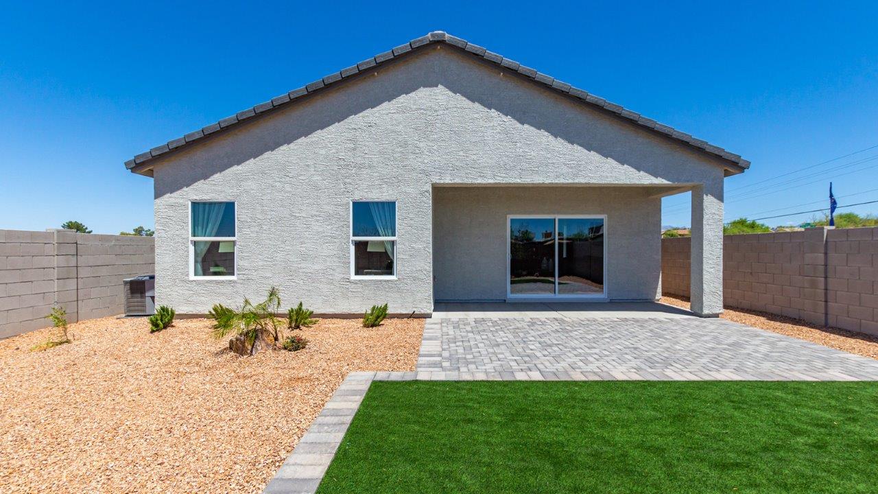 Welcome to The Gaven plan, a spacious single-story within Saguaro Bloom, where modern living meets the serene beauty of the Arizona landscape. This thoughtfully crafted layout offers 1,815 square feet of well-designed living space, featuring four bedrooms and two full bathrooms, perfect for families who value both comfort and style.  As you enter the home, you’ll be greeted by a bright and airy entryway that seamlessly transitions into the heart of the home. The open layout connects the great room, dining area, and kitchen area. The kitchen is a culinary haven, equipped with state-of-the-art appliances, a spacious pantry, and elegant quartz countertops that extend to a large island, perfect for meal prep or casual dining.  The primary suite, nestled at the rear of the home, offers a peaceful retreat with a generously sized walk-in closet and a luxurious en-suite bathroom. The additional three bedrooms are strategically placed to provide privacy and convenience, making them perfect for children, guests, or even a home office. Outside, the covered patio extends your living space, ideal for enjoying Arizona’s stunning sunsets. The front yard is fully landscaped and equipped with an auto drip irrigation system, ensuring your home’s curb appeal is maintained with ease.  Each home within Saguaro Bloom, is outfitted with D.R. Horton’s Home is Connected® Smart Home package, featuring a smart thermostat, video doorbell, keyless entry, and Wi-Fi-enabled garage door opener. Energy efficiency is a cornerstone of the design, with features like spray foam insulation, tankless water heater, and LED lighting, all contributing to long-term savings and environmental sustainability.  Saguaro Bloom is a vibrant community with a wealth of amenities, from scenic walking trails to pools and playgrounds, ensuring that there’s always something for everyone. Embrace the lifestyle you’ve always dreamed of in The Gaven — a perfect blend of comfort, convenience, and Arizona charm.  *Images shown are for reference only. They depict the Gaven model home and may not represent the actual home.