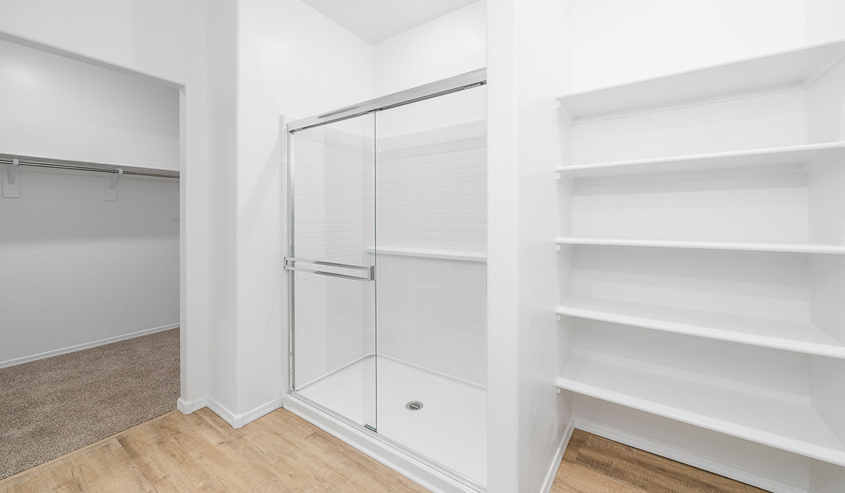 Discover The Easton at Saguaro Bloom in Marana, Arizona – a spacious 1,697 sq. ft. single-story new home designed to offer both style and functionality for today’s modern family.  As you enter through the front porch, you’re welcomed into a thoughtful layout that makes every square foot count. Near the front entrance is the first bedroom intentionally situated. This room can be utilized as a guest room, home office, or a cozy retreat.  Continuing down the hall you're welcomed into the great room, which flows seamlessly into the dining area and kitchen. This open-concept design ensures that the heart of the home is always connected. The kitchen is a culinary dream, featuring quartz countertops, a spacious island with a breakfast bar, and a walk-in pantry.  The great room opens up to a covered patio, an ideal space to unwind and enjoy beautiful desert sunsets. Whether you’re hosting a weekend barbecue or enjoying a quiet evening outdoors, this patio extends your living space into the scenic surroundings of Saguaro Bloom.  Just off the great room, a private hallway leads to the primary suite. The primary suite is generously sized and features a large walk-in closet, en-suite bathroom with walk-in shower, offering both privacy and convenience.  The Easton also features two additional bedrooms, well-positioned to share a full bathroom. These rooms are ideal for family members.  The Easton is designed with energy efficiency in mind and is DOE Zero Energy Ready Home Certified. This home includes a Connected® Smart Home package, featuring a smart thermostat, video doorbell, keyless entry, and Wi-Fi-enabled garage door opener. Energy efficiency is a cornerstone of the design, with features like spray foam insulation, and tankless water heater, offering long-term savings and sustainability.  Saguaro Bloom isn’t just a place to live, it’s a vibrant community with a wealth of amenities, from scenic walking trails to pools and playgrounds, ensuring that there’s always something for everyone.