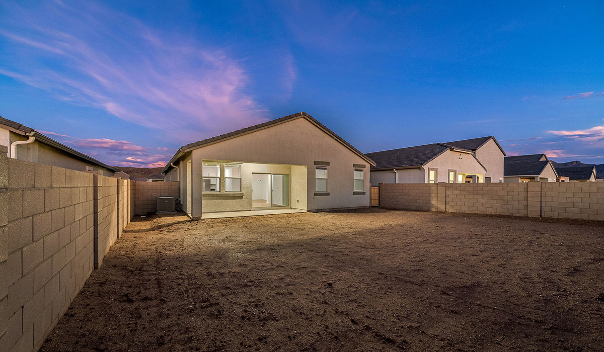 Discover The Easton at Saguaro Bloom in Marana, Arizona – a spacious 1,697 sq. ft. single-story new home designed to offer both style and functionality for today’s modern family.  As you enter through the front porch, you’re welcomed into a thoughtful layout that makes every square foot count. Near the front entrance is the first bedroom intentionally situated. This room can be utilized as a guest room, home office, or a cozy retreat.  Continuing down the hall you're welcomed into the great room, which flows seamlessly into the dining area and kitchen. This open-concept design ensures that the heart of the home is always connected. The kitchen is a culinary dream, featuring quartz countertops, a spacious island with a breakfast bar, and a walk-in pantry.  The great room opens up to a covered patio, an ideal space to unwind and enjoy beautiful desert sunsets. Whether you’re hosting a weekend barbecue or enjoying a quiet evening outdoors, this patio extends your living space into the scenic surroundings of Saguaro Bloom.  Just off the great room, a private hallway leads to the primary suite. The primary suite is generously sized and features a large walk-in closet, en-suite bathroom with walk-in shower, offering both privacy and convenience.  The Easton also features two additional bedrooms, well-positioned to share a full bathroom. These rooms are ideal for family members.  The Easton is designed with energy efficiency in mind and is DOE Zero Energy Ready Home Certified. This home includes a Connected® Smart Home package, featuring a smart thermostat, video doorbell, keyless entry, and Wi-Fi-enabled garage door opener. Energy efficiency is a cornerstone of the design, with features like spray foam insulation, and tankless water heater, offering long-term savings and sustainability.  Saguaro Bloom isn’t just a place to live, it’s a vibrant community with a wealth of amenities, from scenic walking trails to pools and playgrounds, ensuring that there’s always something for everyone.  *Images shown are for reference only. They depict The Easton spec home and may not represent the actual home.