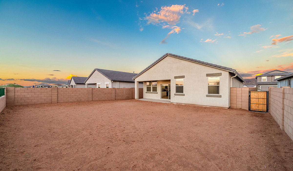 Discover The Easton at Saguaro Bloom in Marana, Arizona – a spacious 1,697 sq. ft. single-story new home designed to offer both style and functionality for today’s modern family.  As you enter through the front porch, you’re welcomed into a thoughtful layout that makes every square foot count. Near the front entrance is the first bedroom intentionally situated. This room can be utilized as a guest room, home office, or a cozy retreat.  Continuing down the hall you're welcomed into the great room, which flows seamlessly into the dining area and kitchen. This open-concept design ensures that the heart of the home is always connected. The kitchen is a culinary dream, featuring quartz countertops, a spacious island with a breakfast bar, and a walk-in pantry.  The great room opens up to a covered patio, an ideal space to unwind and enjoy beautiful desert sunsets. Whether you’re hosting a weekend barbecue or enjoying a quiet evening outdoors, this patio extends your living space into the scenic surroundings of Saguaro Bloom.  Just off the great room, a private hallway leads to the primary suite. The primary suite is generously sized and features a large walk-in closet, en-suite bathroom with walk-in shower, offering both privacy and convenience.  The Easton also features two additional bedrooms, well-positioned to share a full bathroom. These rooms are ideal for family members.  The Easton is designed with energy efficiency in mind and is DOE Zero Energy Ready Home Certified. This home includes a Connected® Smart Home package, featuring a smart thermostat, video doorbell, keyless entry, and Wi-Fi-enabled garage door opener. Energy efficiency is a cornerstone of the design, with features like spray foam insulation, and tankless water heater, offering long-term savings and sustainability.  Saguaro Bloom isn’t just a place to live, it’s a vibrant community with a wealth of amenities, from scenic walking trails to pools and playgrounds, ensuring that there’s always something for everyone.  *Images shown are for reference only. They depict The Easton spec home and may not represent the actual home.