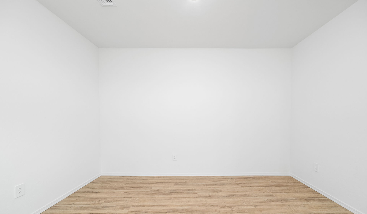 Discover The Easton at Saguaro Bloom in Marana, Arizona – a spacious 1,697 sq. ft. single-story new home designed to offer both style and functionality for today’s modern family.  As you enter through the front porch, you’re welcomed into a thoughtful layout that makes every square foot count. Near the front entrance is the first bedroom intentionally situated. This room can be utilized as a guest room, home office, or a cozy retreat.  Continuing down the hall you're welcomed into the great room, which flows seamlessly into the dining area and kitchen. This open-concept design ensures that the heart of the home is always connected. The kitchen is a culinary dream, featuring quartz countertops, a spacious island with a breakfast bar, and a walk-in pantry.  The great room opens up to a covered patio, an ideal space to unwind and enjoy beautiful desert sunsets. Whether you’re hosting a weekend barbecue or enjoying a quiet evening outdoors, this patio extends your living space into the scenic surroundings of Saguaro Bloom.  Just off the great room, a private hallway leads to the primary suite. The primary suite is generously sized and features a large walk-in closet, en-suite bathroom with walk-in shower, offering both privacy and convenience.  The Easton also features two additional bedrooms, well-positioned to share a full bathroom. These rooms are ideal for family members.  The Easton is designed with energy efficiency in mind and is DOE Zero Energy Ready Home Certified. This home includes a Connected® Smart Home package, featuring a smart thermostat, video doorbell, keyless entry, and Wi-Fi-enabled garage door opener. Energy efficiency is a cornerstone of the design, with features like spray foam insulation, and tankless water heater, offering long-term savings and sustainability.  Saguaro Bloom isn’t just a place to live, it’s a vibrant community with a wealth of amenities, from scenic walking trails to pools and playgrounds, ensuring that there’s always something for everyone.