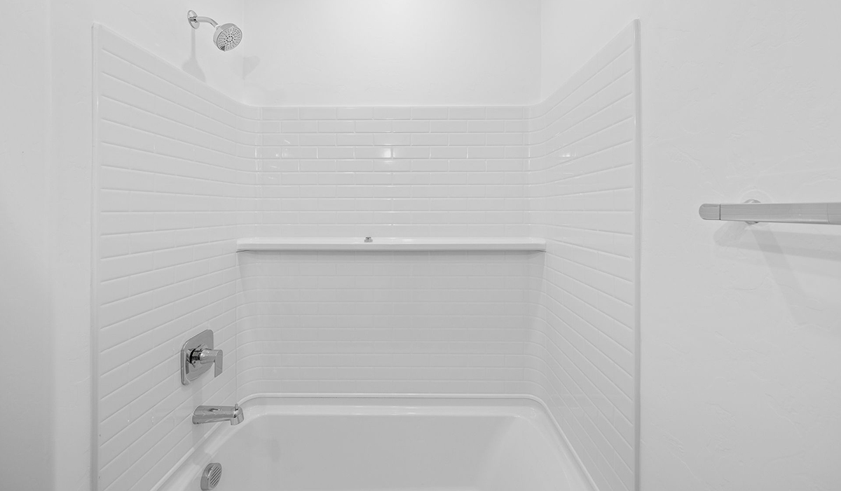 Discover The Easton at Saguaro Bloom in Marana, Arizona – a spacious 1,697 sq. ft. single-story new home designed to offer both style and functionality for today’s modern family.  As you enter through the front porch, you’re welcomed into a thoughtful layout that makes every square foot count. Near the front entrance is the first bedroom intentionally situated. This room can be utilized as a guest room, home office, or a cozy retreat.  Continuing down the hall you're welcomed into the great room, which flows seamlessly into the dining area and kitchen. This open-concept design ensures that the heart of the home is always connected. The kitchen is a culinary dream, featuring quartz countertops, a spacious island with a breakfast bar, and a walk-in pantry.  The great room opens up to a covered patio, an ideal space to unwind and enjoy beautiful desert sunsets. Whether you’re hosting a weekend barbecue or enjoying a quiet evening outdoors, this patio extends your living space into the scenic surroundings of Saguaro Bloom.  Just off the great room, a private hallway leads to the primary suite. The primary suite is generously sized and features a large walk-in closet, en-suite bathroom with walk-in shower, offering both privacy and convenience.  The Easton also features two additional bedrooms, well-positioned to share a full bathroom. These rooms are ideal for family members.  The Easton is designed with energy efficiency in mind and is DOE Zero Energy Ready Home Certified. This home includes a Connected® Smart Home package, featuring a smart thermostat, video doorbell, keyless entry, and Wi-Fi-enabled garage door opener. Energy efficiency is a cornerstone of the design, with features like spray foam insulation, and tankless water heater, offering long-term savings and sustainability.  Saguaro Bloom isn’t just a place to live, it’s a vibrant community with a wealth of amenities, from scenic walking trails to pools and playgrounds, ensuring that there’s always something for everyone.