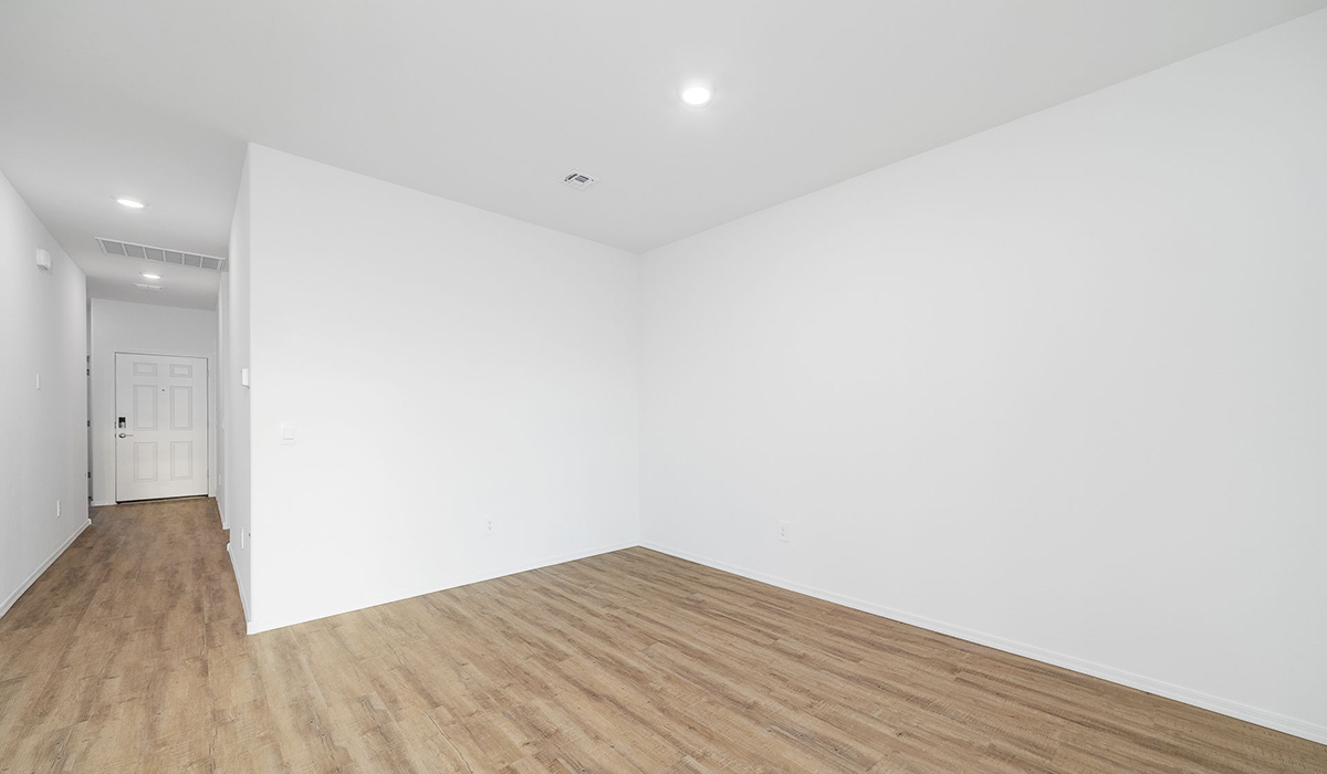 Discover The Easton at Saguaro Bloom in Marana, Arizona – a spacious 1,697 sq. ft. single-story new home designed to offer both style and functionality for today’s modern family.  As you enter through the front porch, you’re welcomed into a thoughtful layout that makes every square foot count. Near the front entrance is the first bedroom intentionally situated. This room can be utilized as a guest room, home office, or a cozy retreat.  Continuing down the hall you're welcomed into the great room, which flows seamlessly into the dining area and kitchen. This open-concept design ensures that the heart of the home is always connected. The kitchen is a culinary dream, featuring quartz countertops, a spacious island with a breakfast bar, and a walk-in pantry.  The great room opens up to a covered patio, an ideal space to unwind and enjoy beautiful desert sunsets. Whether you’re hosting a weekend barbecue or enjoying a quiet evening outdoors, this patio extends your living space into the scenic surroundings of Saguaro Bloom.  Just off the great room, a private hallway leads to the primary suite. The primary suite is generously sized and features a large walk-in closet, en-suite bathroom with walk-in shower, offering both privacy and convenience.  The Easton also features two additional bedrooms, well-positioned to share a full bathroom. These rooms are ideal for family members.  The Easton is designed with energy efficiency in mind and is DOE Zero Energy Ready Home Certified. This home includes a Connected® Smart Home package, featuring a smart thermostat, video doorbell, keyless entry, and Wi-Fi-enabled garage door opener. Energy efficiency is a cornerstone of the design, with features like spray foam insulation, and tankless water heater, offering long-term savings and sustainability.  Saguaro Bloom isn’t just a place to live, it’s a vibrant community with a wealth of amenities, from scenic walking trails to pools and playgrounds, ensuring that there’s always something for everyone.