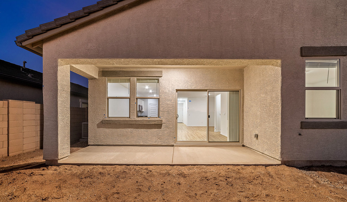 Discover The Easton at Saguaro Bloom in Marana, Arizona – a spacious 1,697 sq. ft. single-story new home designed to offer both style and functionality for today’s modern family.  As you enter through the front porch, you’re welcomed into a thoughtful layout that makes every square foot count. Near the front entrance is the first bedroom intentionally situated. This room can be utilized as a guest room, home office, or a cozy retreat.  Continuing down the hall you're welcomed into the great room, which flows seamlessly into the dining area and kitchen. This open-concept design ensures that the heart of the home is always connected. The kitchen is a culinary dream, featuring quartz countertops, a spacious island with a breakfast bar, and a walk-in pantry.  The great room opens up to a covered patio, an ideal space to unwind and enjoy beautiful desert sunsets. Whether you’re hosting a weekend barbecue or enjoying a quiet evening outdoors, this patio extends your living space into the scenic surroundings of Saguaro Bloom.  Just off the great room, a private hallway leads to the primary suite. The primary suite is generously sized and features a large walk-in closet, en-suite bathroom with walk-in shower, offering both privacy and convenience.  The Easton also features two additional bedrooms, well-positioned to share a full bathroom. These rooms are ideal for family members.  The Easton is designed with energy efficiency in mind and is DOE Zero Energy Ready Home Certified. This home includes a Connected® Smart Home package, featuring a smart thermostat, video doorbell, keyless entry, and Wi-Fi-enabled garage door opener. Energy efficiency is a cornerstone of the design, with features like spray foam insulation, and tankless water heater, offering long-term savings and sustainability.  Saguaro Bloom isn’t just a place to live, it’s a vibrant community with a wealth of amenities, from scenic walking trails to pools and playgrounds, ensuring that there’s always something for everyone.