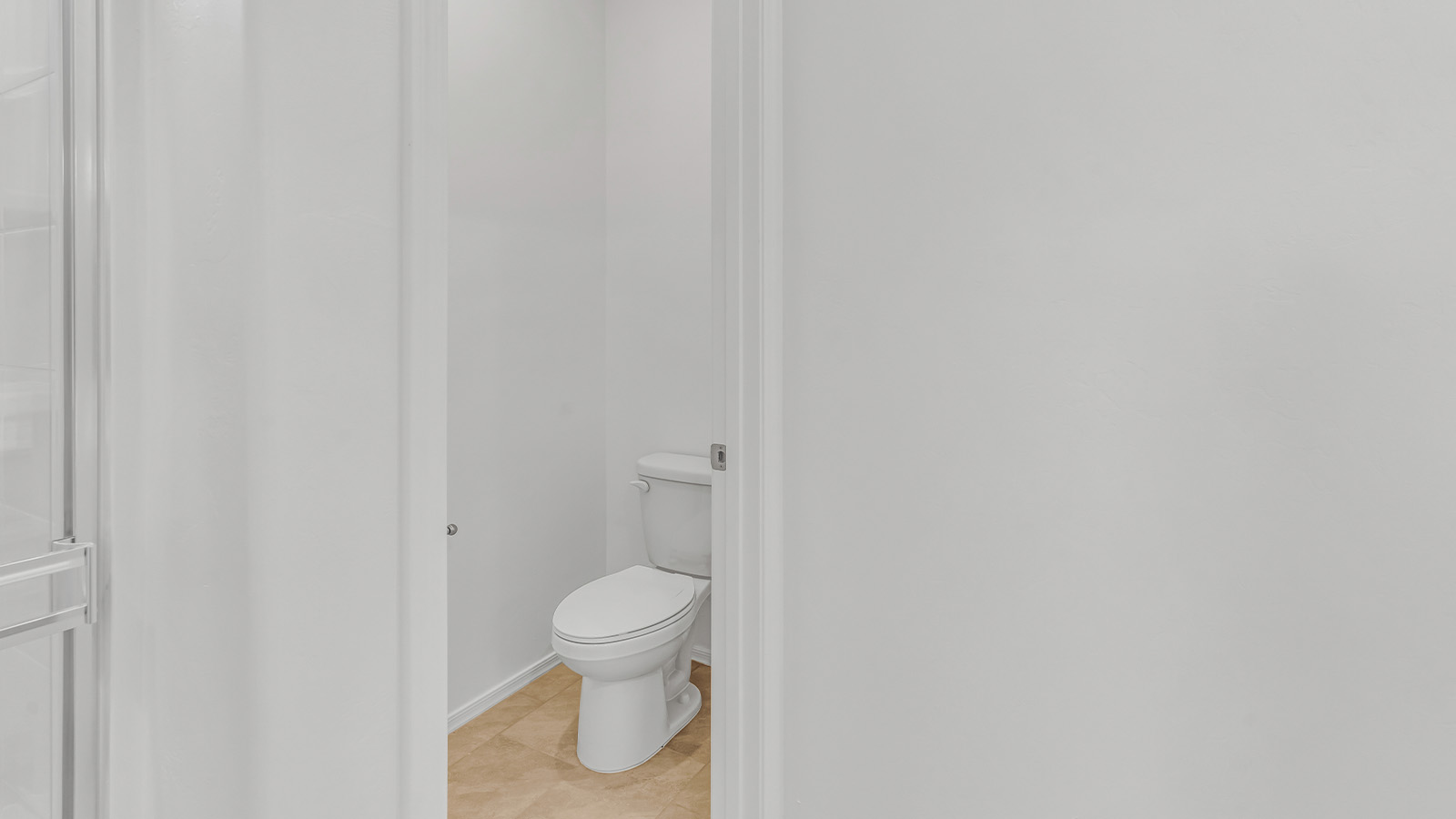 Welcome to The Pearl, a beautifully designed single-story new home located in the serene Cholla Ridge neighborhood of Saguaro Bloom. Spanning 2,431 square feet, this home offers four spacious bedrooms and three full bathrooms, making it an ideal choice for families who value both space and comfort.  As you enter through the front porch, you’re welcomed into a bright and open entryway that leads to the heart of the home. The expansive great room, dining area, and kitchen are seamlessly connected, providing a perfect setting for both everyday living and entertaining. The kitchen is a chef’s delight, featuring a large island, granite countertops, and Shaker-style cabinetry in double espresso. With a generously sized pantry and modern stainless steel gas appliances, this kitchen is both functional and stylish.  The Pearl’s layout includes a well-placed primary bedroom at the rear of the home, ensuring privacy and tranquility. The primary suite features a spacious walk-in closet and an en-suite bathroom with dual executive-height vanities and a large walk-in shower. The additional three bedrooms are located towards the front and sides of the home, each offering ample closet space and access to two full bathrooms, making this layout perfect for families and guests alike.  The outdoor living space is just as inviting, with a covered patio that extends from the great room, providing an ideal spot for enjoying Arizona’s beautiful weather. Whether you’re hosting a gathering or simply relaxing with a good book, this space is designed for your enjoyment.  The Pearl also features a dedicated utility room near the kitchen, making household tasks more convenient. A two-car garage offers plenty of space for vehicles and additional storage.  Built with energy efficiency and modern living in mind, The Pearl incorporates eco-friendly features and smart home technology, ensuring a comfortable and sustainable lifestyle. Large windows throughout the home allow natural light to flood the space, creating a warm and inviting atmosphere.  Located within the exclusive Cholla Ridge neighborhood at Saguaro Bloom, residents of The Pearl enjoy a range of amenities, including beautiful 12x24” tile flooring, and gourmet kitchens in select homes, all on lots with no rear neighbors. The community offers access to two pools, walking trails, and parks, all set against the stunning backdrop of the Tucson Mountains.  The Pearl combines style, comfort, and practicality, making it a perfect place to call home in one of Marana’s most sought-after communities.