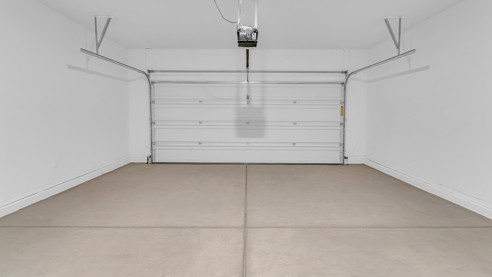 Welcome to The Pearl, a beautifully designed single-story new home located in the serene Cholla Ridge neighborhood of Saguaro Bloom. Spanning 2,431 square feet, this home offers four spacious bedrooms and three full bathrooms, making it an ideal choice for families who value both space and comfort.  As you enter through the front porch, you’re welcomed into a bright and open entryway that leads to the heart of the home. The expansive great room, dining area, and kitchen are seamlessly connected, providing a perfect setting for both everyday living and entertaining. The kitchen is a chef’s delight, featuring a large island, granite countertops, and Shaker-style cabinetry in double espresso. With a generously sized pantry and modern stainless steel gas appliances, this kitchen is both functional and stylish.  The Pearl’s layout includes a well-placed primary bedroom at the rear of the home, ensuring privacy and tranquility. The primary suite features a spacious walk-in closet and an en-suite bathroom with dual executive-height vanities and a large walk-in shower. The additional three bedrooms are located towards the front and sides of the home, each offering ample closet space and access to two full bathrooms, making this layout perfect for families and guests alike.  The outdoor living space is just as inviting, with a covered patio that extends from the great room, providing an ideal spot for enjoying Arizona’s beautiful weather. Whether you’re hosting a gathering or simply relaxing with a good book, this space is designed for your enjoyment.  The Pearl also features a dedicated utility room near the kitchen, making household tasks more convenient. A two-car garage offers plenty of space for vehicles and additional storage.  Built with energy efficiency and modern living in mind, The Pearl incorporates eco-friendly features and smart home technology, ensuring a comfortable and sustainable lifestyle. Large windows throughout the home allow natural light to flood the space, creating a warm and inviting atmosphere.  Located within the exclusive Cholla Ridge neighborhood at Saguaro Bloom, residents of The Pearl enjoy a range of amenities, including beautiful 12x24” tile flooring, and gourmet kitchens in select homes, all on lots with no rear neighbors. The community offers access to two pools, walking trails, and parks, all set against the stunning backdrop of the Tucson Mountains.  The Pearl combines style, comfort, and practicality, making it a perfect place to call home in one of Marana’s most sought-after communities.