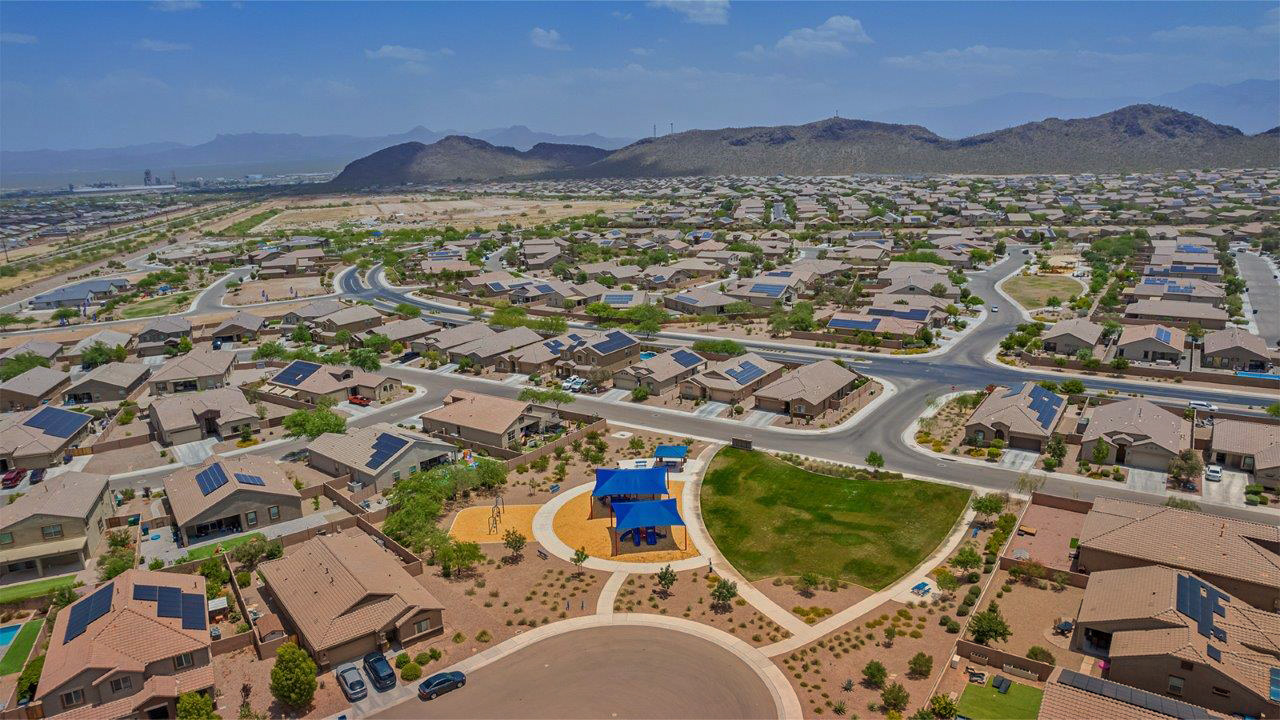 Welcome to The Citrine, a spacious single-story new home located in the tranquil Cholla Ridge neighborhood of Saguaro Bloom. With 2,577 square feet of well-planned living space, this home offers four bedrooms, three bathrooms, and a dedicated study, making it ideal for families who value both space and convenience.  As you enter through the inviting covered porch, you’re greeted by a bright and airy entryway that flows into the heart of the home. The expansive great room, dining area, and kitchen are thoughtfully connected, creating an ideal space for entertaining or simply enjoying time with family. The kitchen is a chef's dream, featuring a large island, granite countertops, and Shaker-style cabinetry in double espresso. A spacious pantry and modern stainless steel gas appliances ensure that this kitchen is both functional and stylish.  The Citrine’s layout includes a generously sized primary bedroom, carefully positioned for privacy at the rear of the home. This room features a large walk-in closet and an en-suite bathroom with dual executive-height vanities and a luxurious super shower. The additional three bedrooms are well-sized and located in separate areas of the home, ensuring privacy and easy access to two more full bathrooms.  One of the highlights of The Citrine is its versatile study, which can be used as a home office, library, media room, or extra bedroom depending on your needs. The large laundry room, conveniently situated near the bedrooms, adds to the home’s practicality.  The covered patio, accessible from the great room, offers a perfect spot for outdoor living, where you can enjoy Arizona’s beautiful weather throughout the year. Whether you’re hosting a barbecue or simply relaxing, this outdoor space enhances the home’s appeal.  Designed with energy efficiency and modern living in mind, The Citrine includes eco-friendly features and smart home technology, ensuring comfort and sustainability. Large windows throughout the home allow natural light to brighten every corner, creating a warm and welcoming atmosphere.  Located within the exclusive Cholla Ridge neighborhood at Saguaro Bloom, residents of The Citrine enjoy a range of premium features, including beautiful 12x24” tile flooring, gourmet kitchens, and 10’ ceilings in select homes. The community offers access to two pools, walking trails, parks, and more, all set against the picturesque backdrop of the Tucson Mountains.  The Citrine combines style, comfort, and practicality, making it a perfect place to call home in one of Marana’s most sought-after communities.