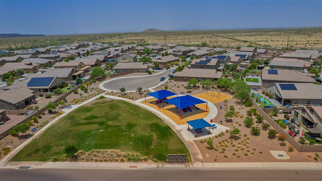 Welcome to The Citrine, a spacious single-story new home located in the tranquil Cholla Ridge neighborhood of Saguaro Bloom. With 2,577 square feet of well-planned living space, this home offers four bedrooms, three bathrooms, and a dedicated study, making it ideal for families who value both space and convenience.  As you enter through the inviting covered porch, you’re greeted by a bright and airy entryway that flows into the heart of the home. The expansive great room, dining area, and kitchen are thoughtfully connected, creating an ideal space for entertaining or simply enjoying time with family. The kitchen is a chef's dream, featuring a large island, granite countertops, and Shaker-style cabinetry in double espresso. A spacious pantry and modern stainless steel gas appliances ensure that this kitchen is both functional and stylish.  The Citrine’s layout includes a generously sized primary bedroom, carefully positioned for privacy at the rear of the home. This room features a large walk-in closet and an en-suite bathroom with dual executive-height vanities and a luxurious super shower. The additional three bedrooms are well-sized and located in separate areas of the home, ensuring privacy and easy access to two more full bathrooms.  One of the highlights of The Citrine is its versatile study, which can be used as a home office, library, media room, or extra bedroom depending on your needs. The large laundry room, conveniently situated near the bedrooms, adds to the home’s practicality.  The covered patio, accessible from the great room, offers a perfect spot for outdoor living, where you can enjoy Arizona’s beautiful weather throughout the year. Whether you’re hosting a barbecue or simply relaxing, this outdoor space enhances the home’s appeal.  Designed with energy efficiency and modern living in mind, The Citrine includes eco-friendly features and smart home technology, ensuring comfort and sustainability. Large windows throughout the home allow natural light to brighten every corner, creating a warm and welcoming atmosphere.  Located within the exclusive Cholla Ridge neighborhood at Saguaro Bloom, residents of The Citrine enjoy a range of premium features, including beautiful 12x24” tile flooring, gourmet kitchens, and 10’ ceilings in select homes. The community offers access to two pools, walking trails, parks, and more, all set against the picturesque backdrop of the Tucson Mountains.  The Citrine combines style, comfort, and practicality, making it a perfect place to call home in one of Marana’s most sought-after communities.
