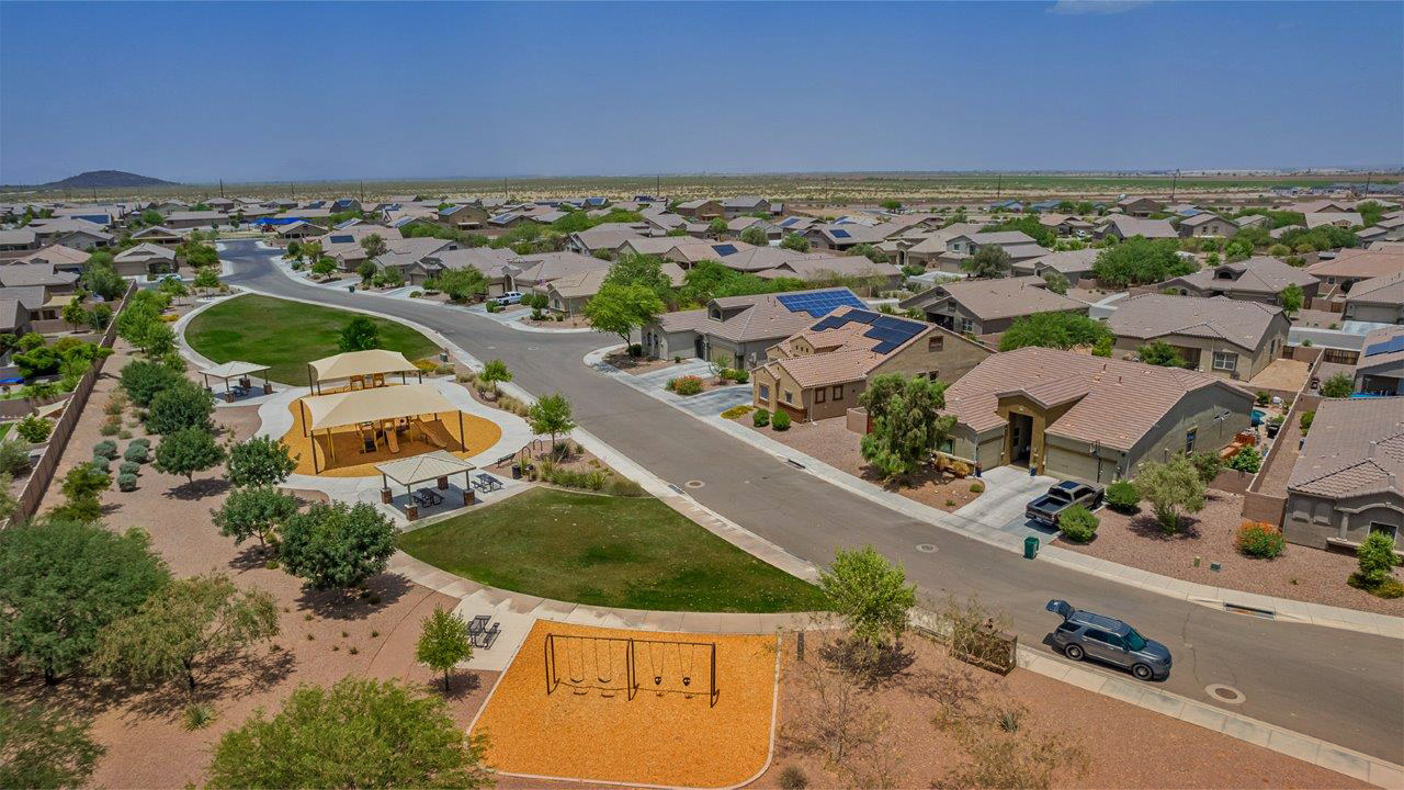 Welcome to The Citrine, a spacious single-story new home located in the tranquil Cholla Ridge neighborhood of Saguaro Bloom. With 2,577 square feet of well-planned living space, this home offers four bedrooms, three bathrooms, and a dedicated study, making it ideal for families who value both space and convenience.  As you enter through the inviting covered porch, you’re greeted by a bright and airy entryway that flows into the heart of the home. The expansive great room, dining area, and kitchen are thoughtfully connected, creating an ideal space for entertaining or simply enjoying time with family. The kitchen is a chef's dream, featuring a large island, granite countertops, and Shaker-style cabinetry in double espresso. A spacious pantry and modern stainless steel gas appliances ensure that this kitchen is both functional and stylish.  The Citrine’s layout includes a generously sized primary bedroom, carefully positioned for privacy at the rear of the home. This room features a large walk-in closet and an en-suite bathroom with dual executive-height vanities and a luxurious super shower. The additional three bedrooms are well-sized and located in separate areas of the home, ensuring privacy and easy access to two more full bathrooms.  One of the highlights of The Citrine is its versatile study, which can be used as a home office, library, media room, or extra bedroom depending on your needs. The large laundry room, conveniently situated near the bedrooms, adds to the home’s practicality.  The covered patio, accessible from the great room, offers a perfect spot for outdoor living, where you can enjoy Arizona’s beautiful weather throughout the year. Whether you’re hosting a barbecue or simply relaxing, this outdoor space enhances the home’s appeal.  Designed with energy efficiency and modern living in mind, The Citrine includes eco-friendly features and smart home technology, ensuring comfort and sustainability. Large windows throughout the home allow natural light to brighten every corner, creating a warm and welcoming atmosphere.  Located within the exclusive Cholla Ridge neighborhood at Saguaro Bloom, residents of The Citrine enjoy a range of premium features, including beautiful 12x24” tile flooring, gourmet kitchens, and 10’ ceilings in select homes. The community offers access to two pools, walking trails, parks, and more, all set against the picturesque backdrop of the Tucson Mountains.  The Citrine combines style, comfort, and practicality, making it a perfect place to call home in one of Marana’s most sought-after communities.